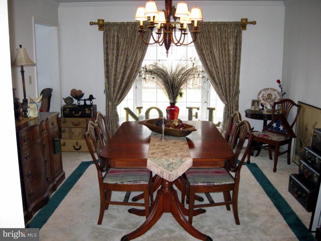 159 1/2 Wesley Road Quarryville, PA 17566 - Photo 8 of 43 a view of a dining room with furniture and a window