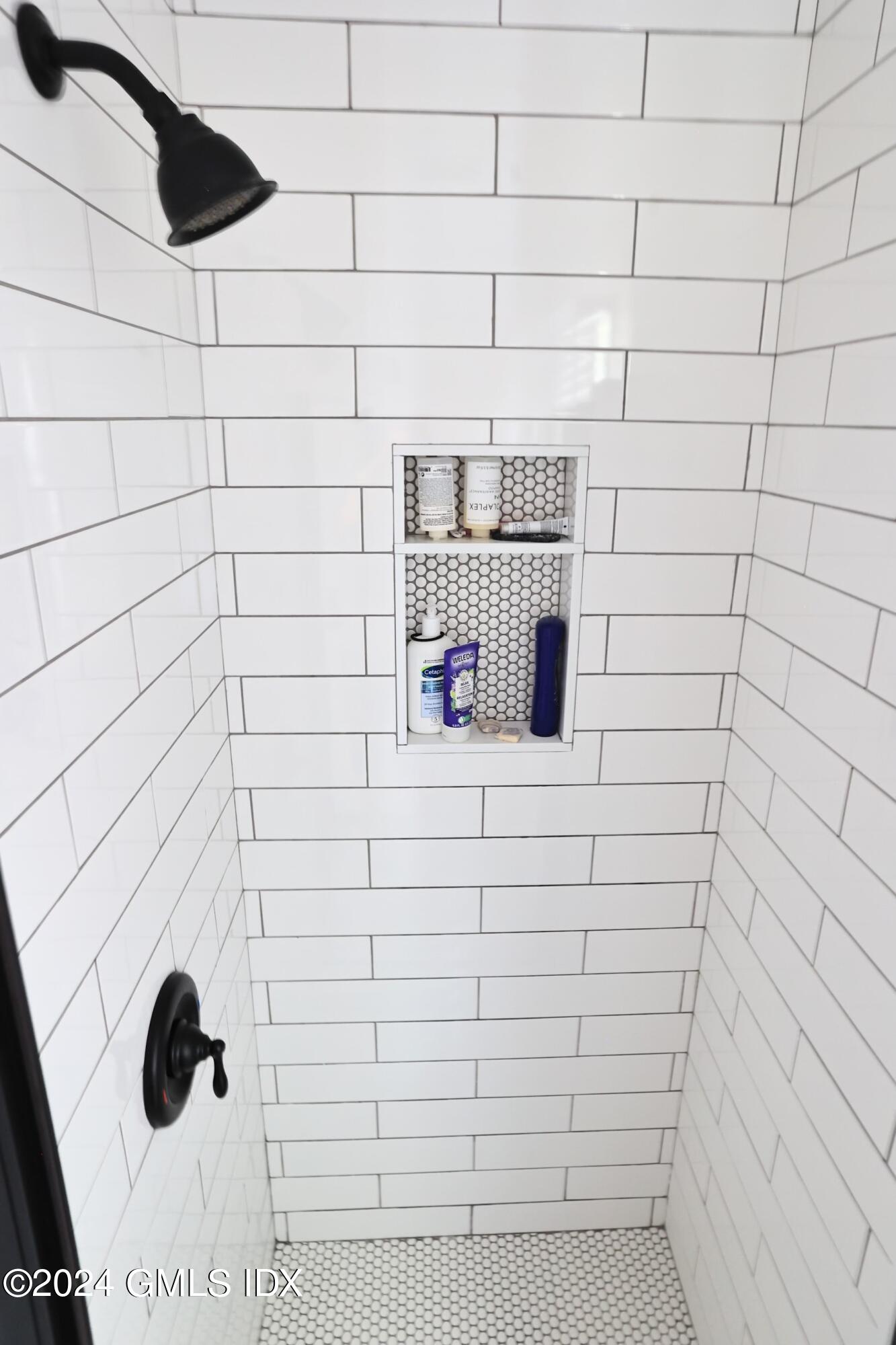 4 Silver Street, Unit B Greenwich, CT 06830 - Photo 14 of 24 a bathroom with a shower