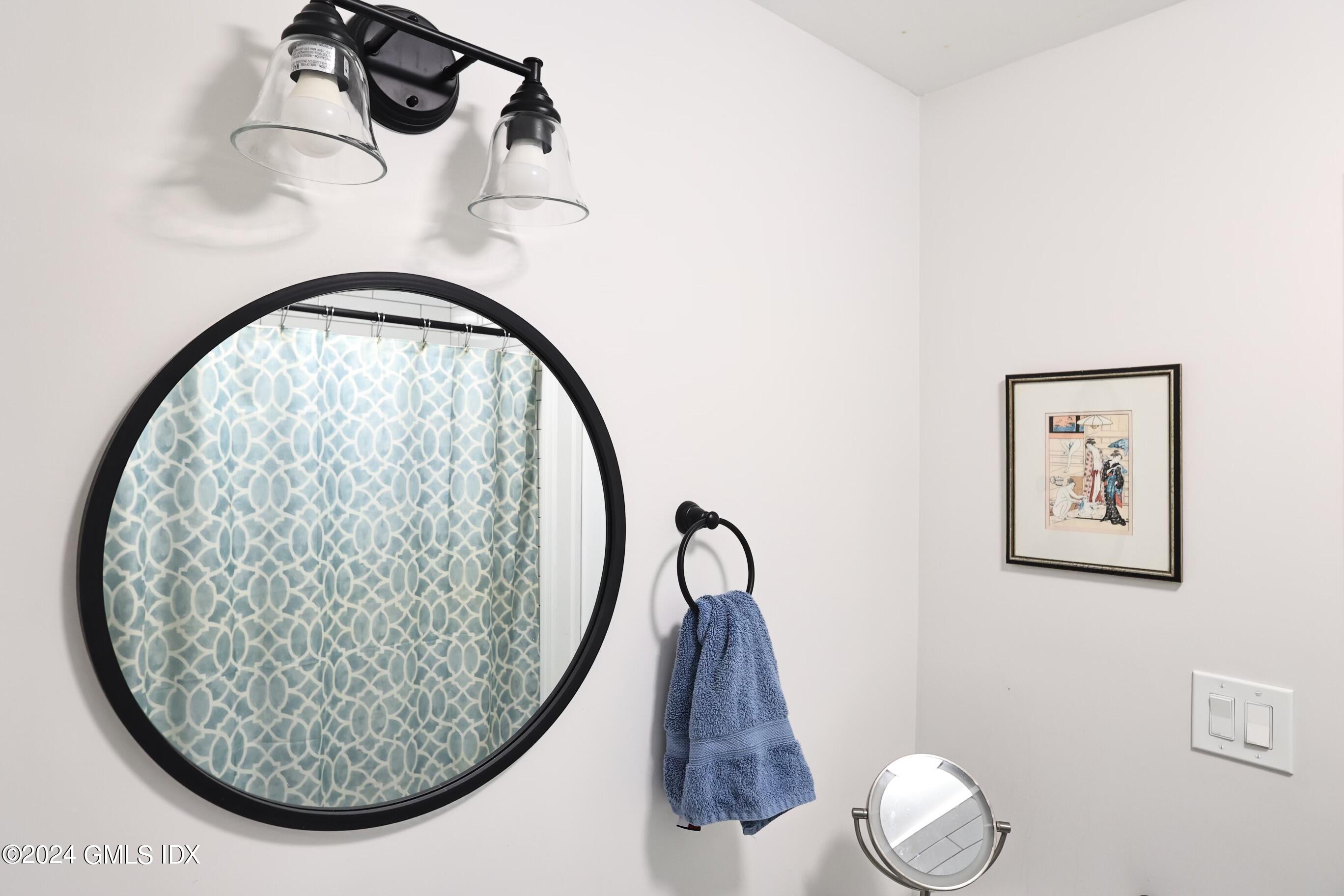 4 Silver Street, Unit B Greenwich, CT 06830 - Photo 17 of 24 a view of a hallway with a chandelier