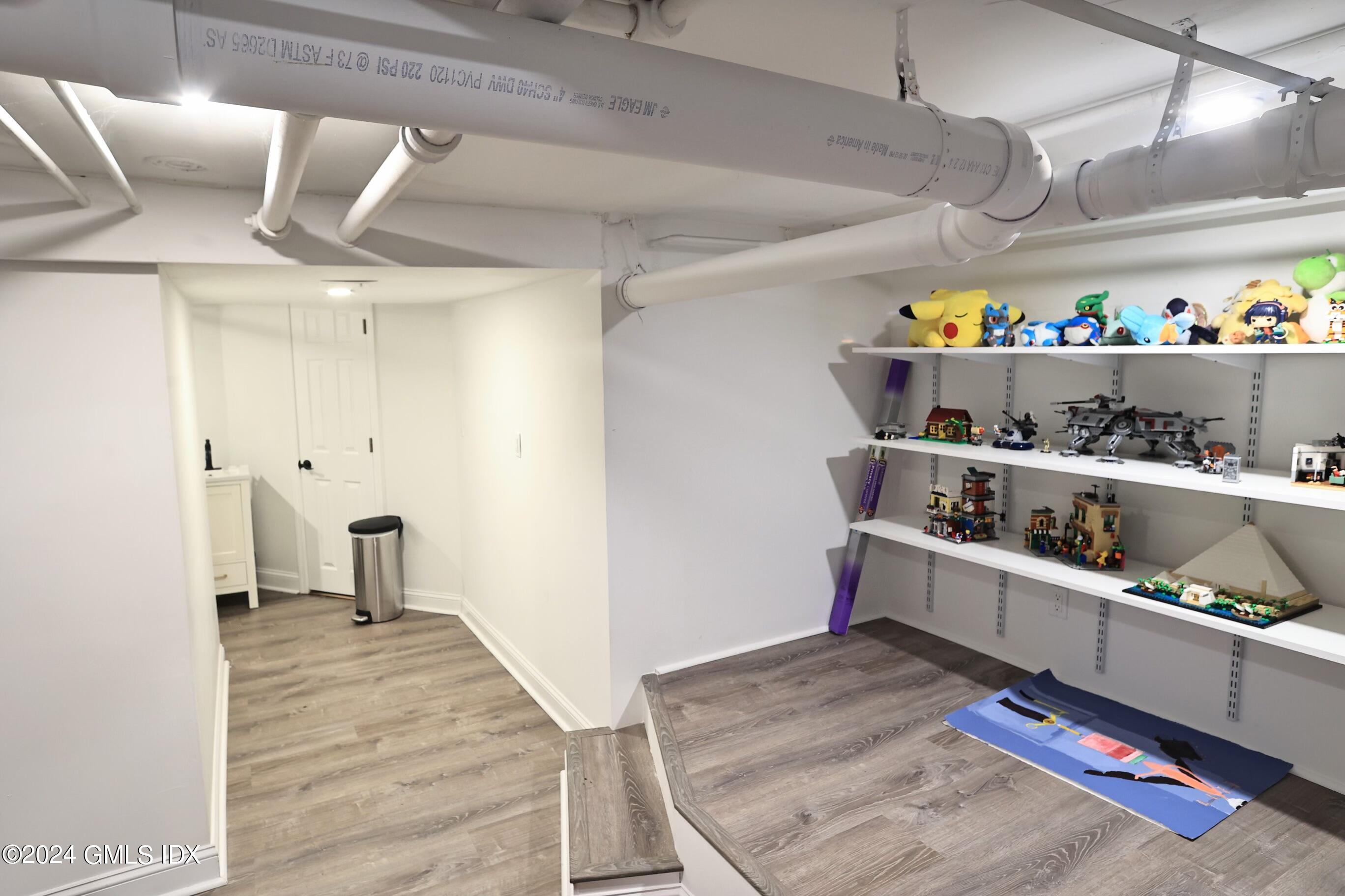 4 Silver Street, Unit B Greenwich, CT 06830 - Photo 19 of 24 a kitchen with stainless steel appliances granite countertop a sink and cabinets