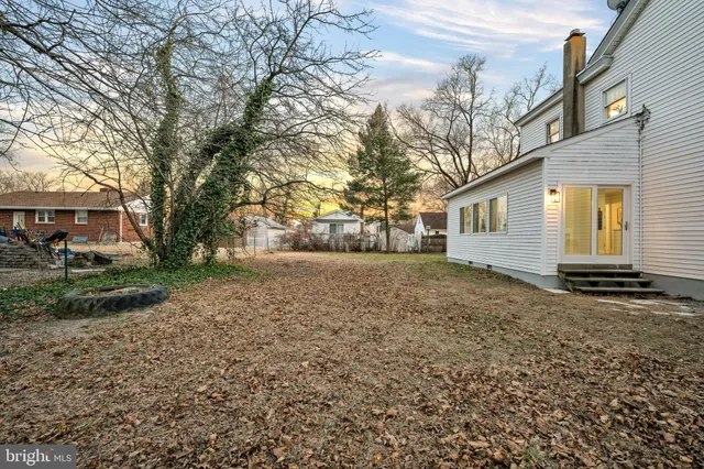 an aerial view of a house with outdoor space
