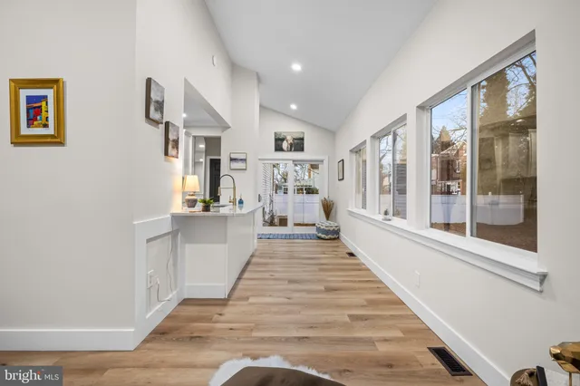 a view of a living room with a large window