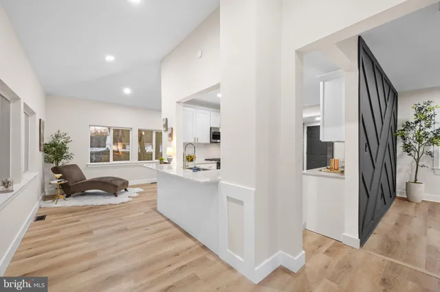 a view of a kitchen from the hallway