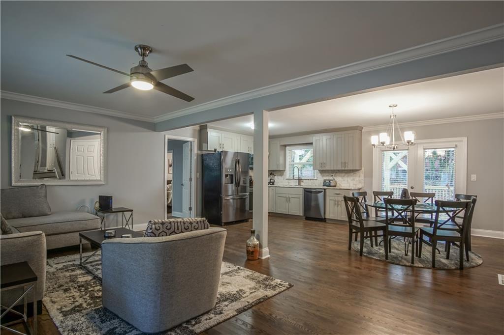 2640 Casher Drive Decatur, GA 30034 - Photo 12 of 40 a living room with couches and kitchen view with wooden floor