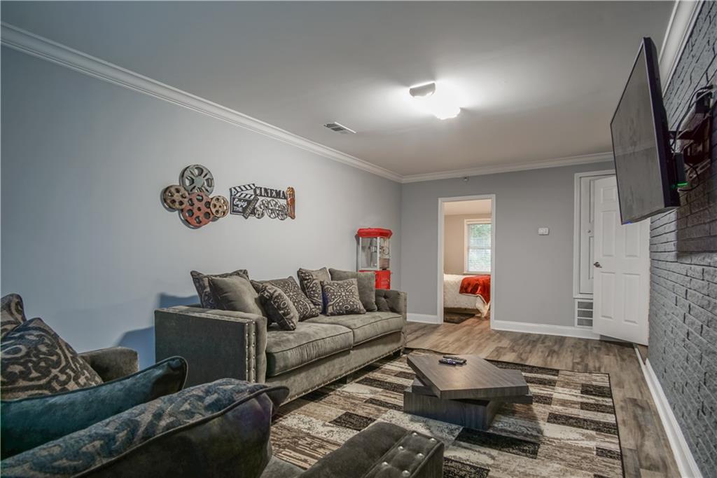 2640 Casher Drive Decatur, GA 30034 - Photo 30 of 40 a living room with furniture and a rug