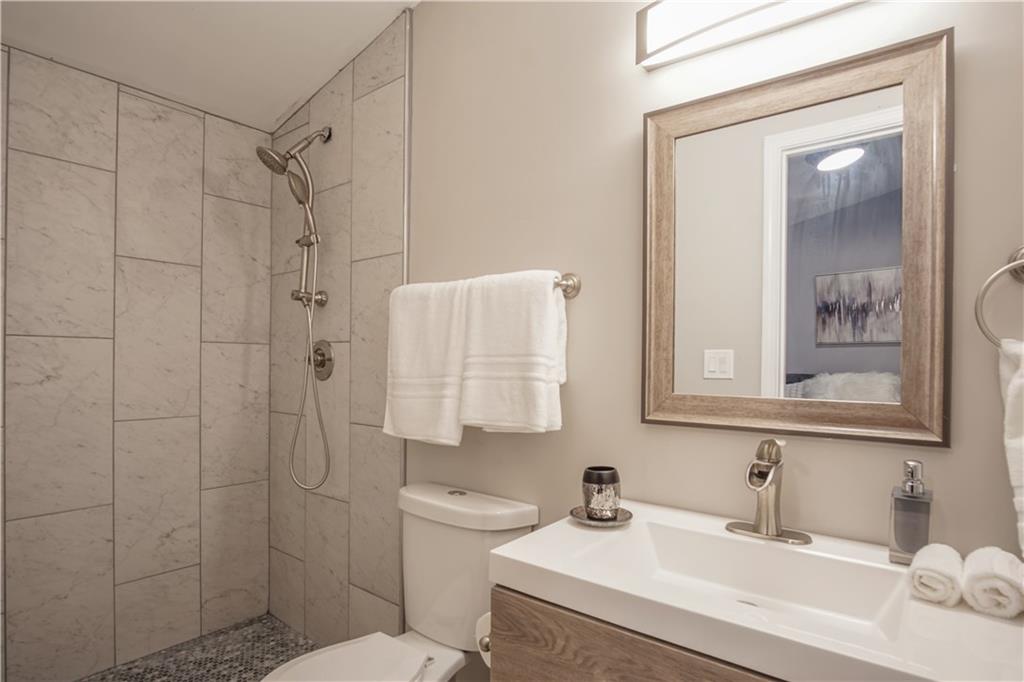 2640 Casher Drive Decatur, GA 30034 - Photo 33 of 40 a bathroom with a sink toilet and shower