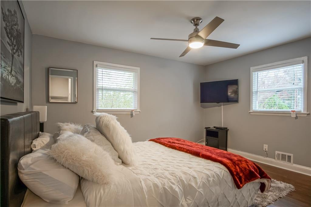 2640 Casher Drive Decatur, GA 30034 - Photo 36 of 40 a bedroom with a bed and a flat screen tv