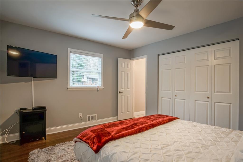 2640 Casher Drive Decatur, GA 30034 - Photo 37 of 40 a bedroom with a bed and a flat screen tv