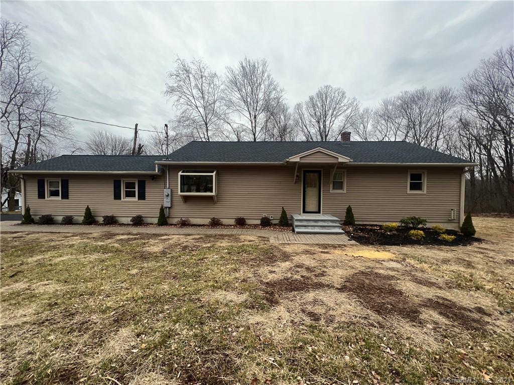 1025 Wolcott Road Wolcott, CT 06716 - Photo 1 of 1 a view of a house with a patio