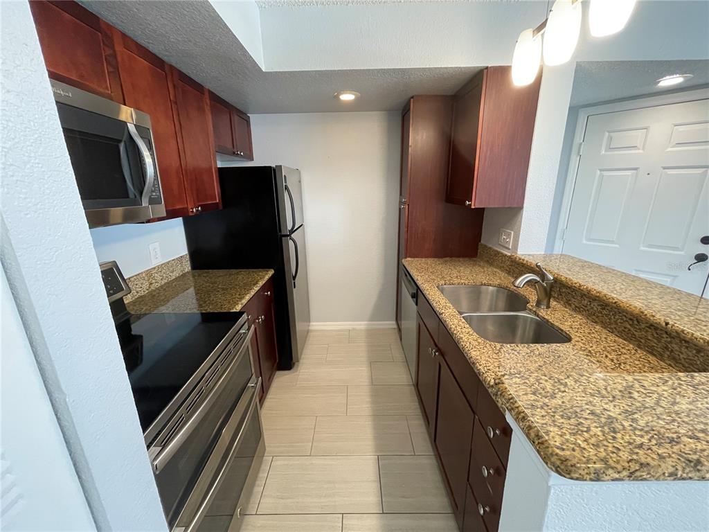 5128 Conroy Road, Unit 13 Orlando, FL 32811 - Photo 2 of 39 Gallery Image 2