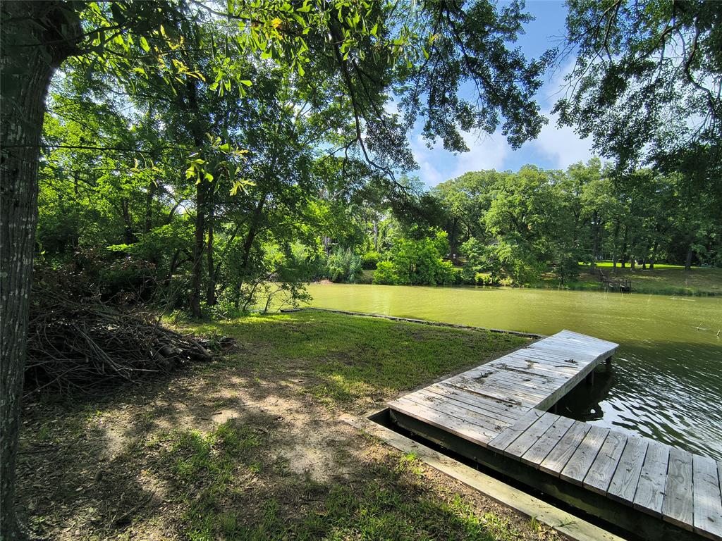 180 Arrowhead Street Mabank, TX 75156 - Photo 21 of 26 a view of a wooden floor and lake view