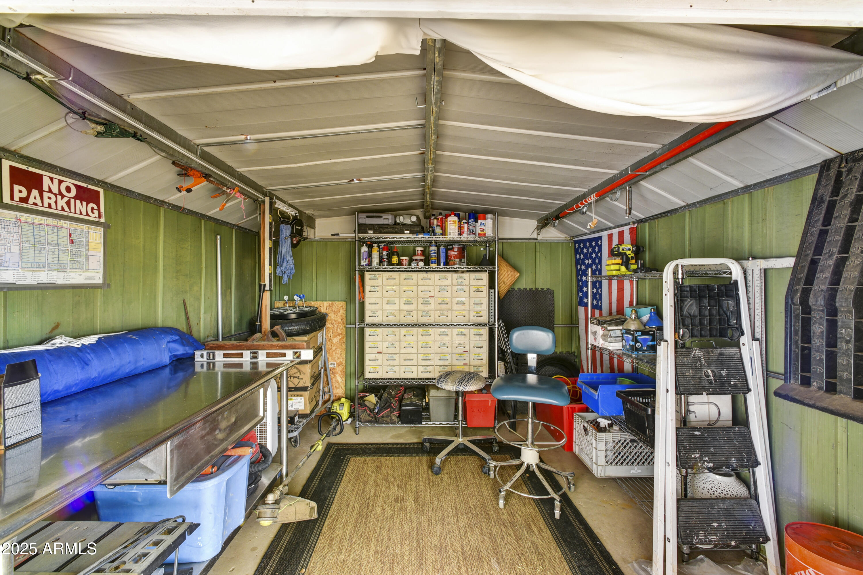 2045 West Orange Drive Phoenix, AZ 85015 - Photo 13 of 20 a room with lots of furniture and white walls