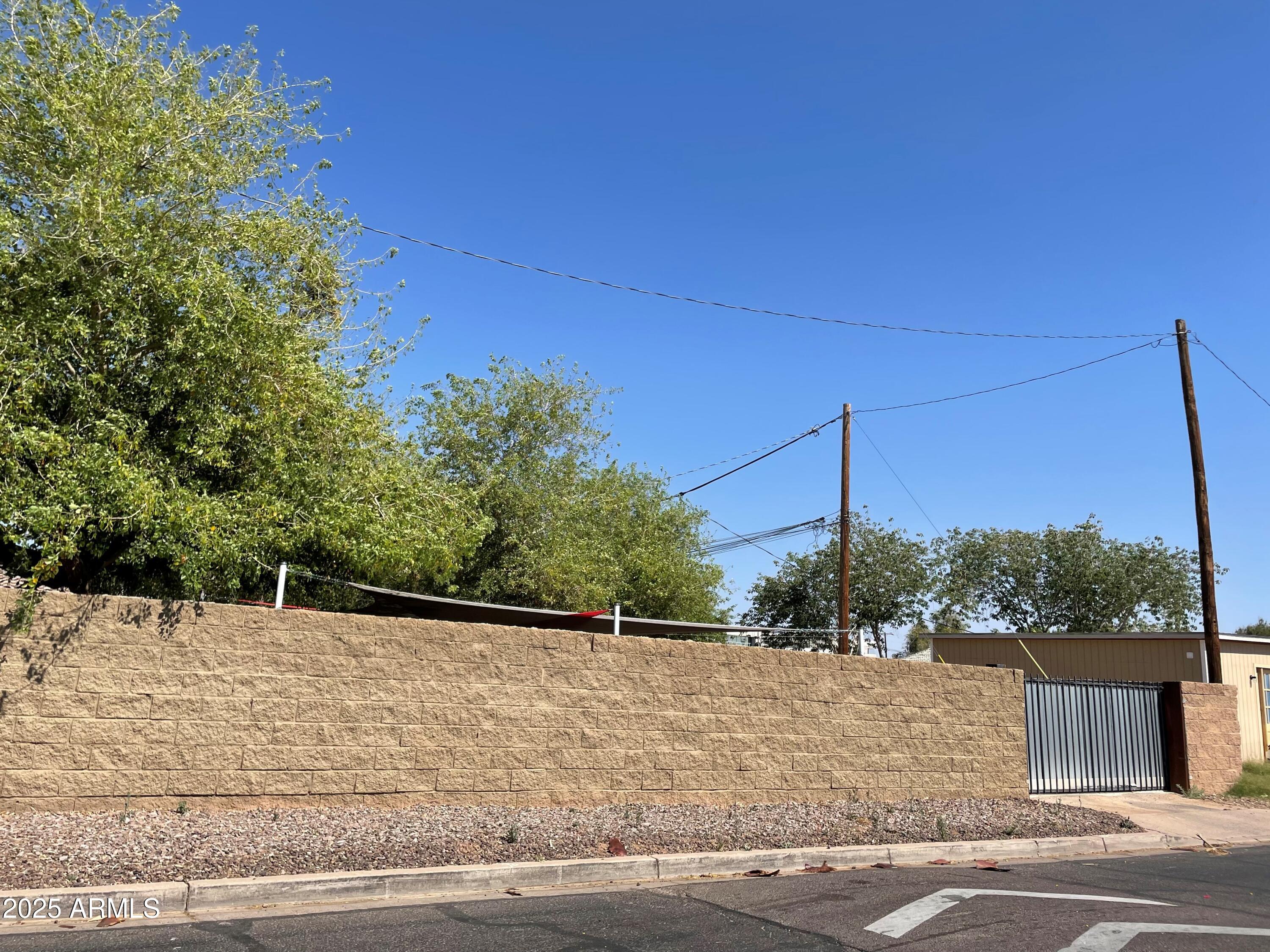 2045 West Orange Drive Phoenix, AZ 85015 - Photo 17 of 20 a backyard of a house