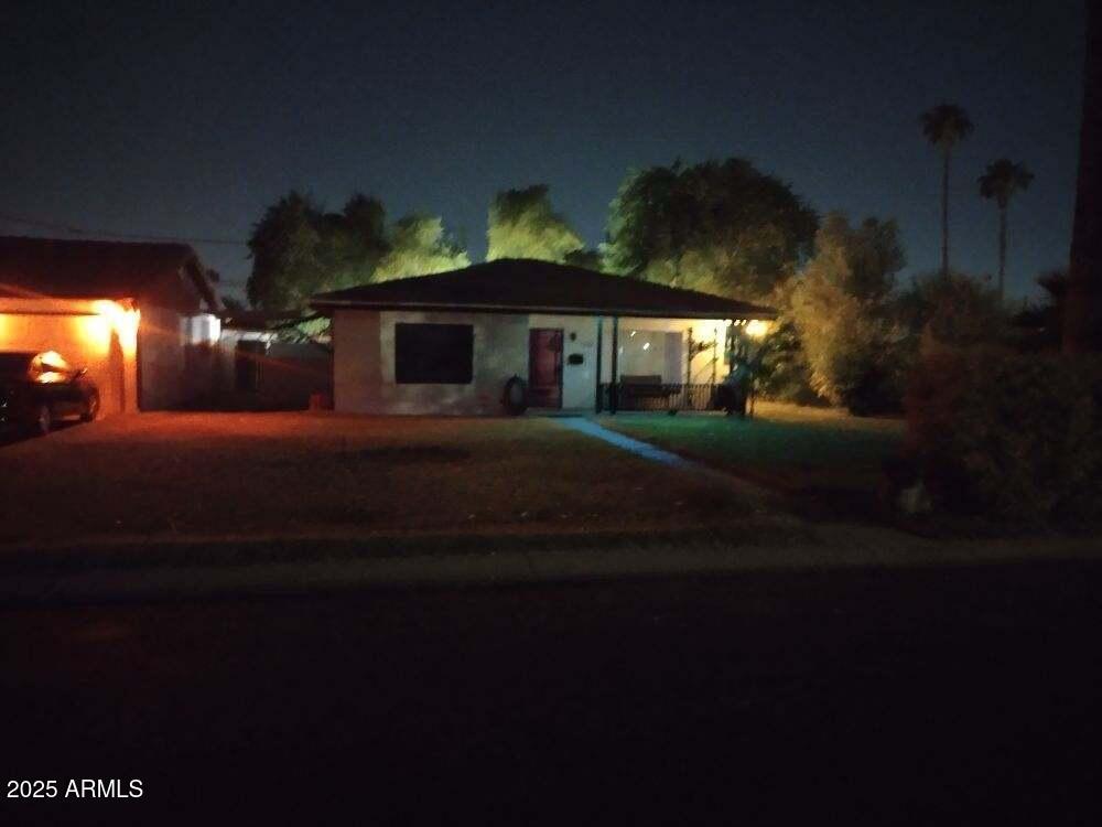 2045 West Orange Drive Phoenix, AZ 85015 - Photo 18 of 20 a front view of a house with a yard