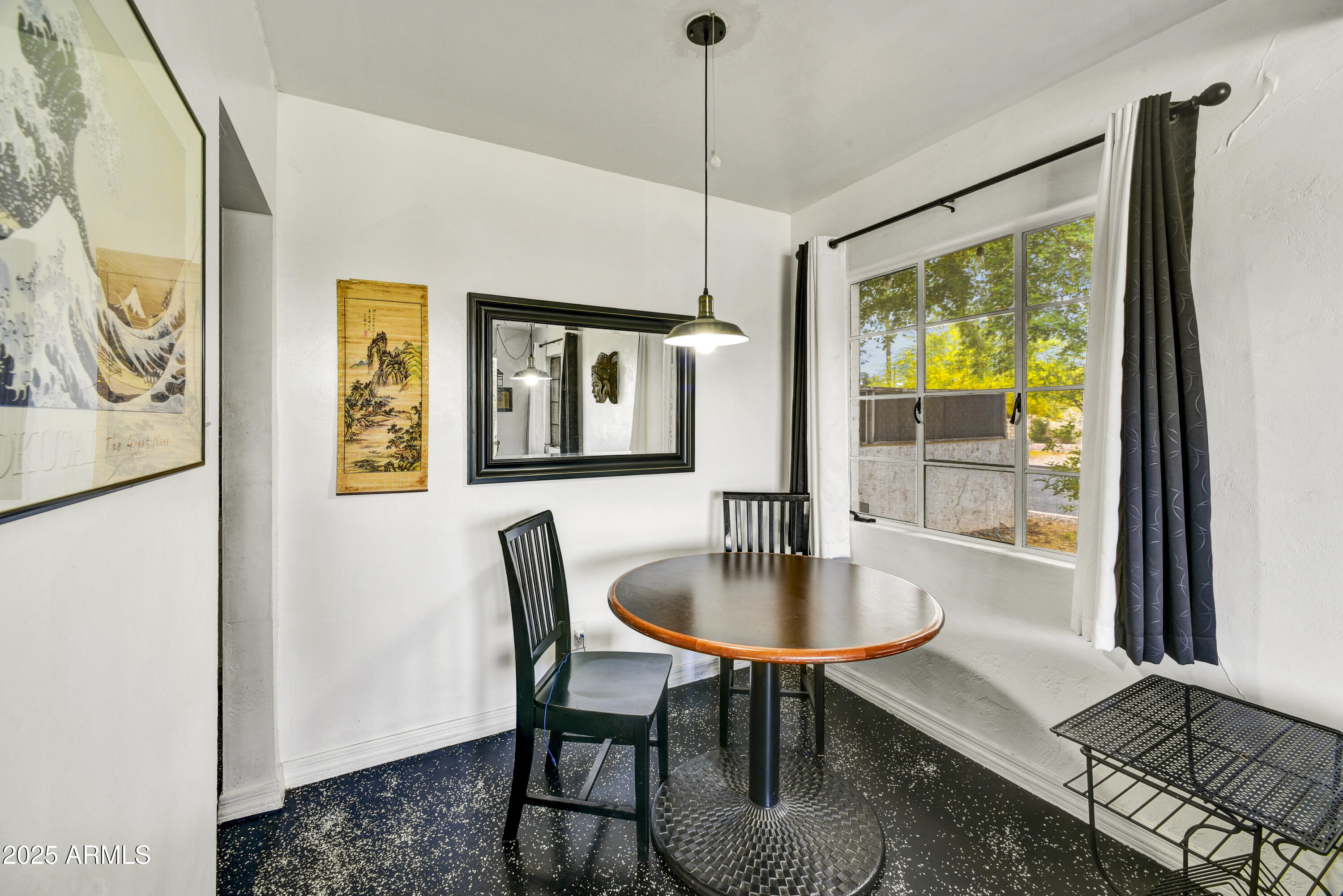 2045 West Orange Drive Phoenix, AZ 85015 - Photo 5 of 20 a dining room with furniture and window