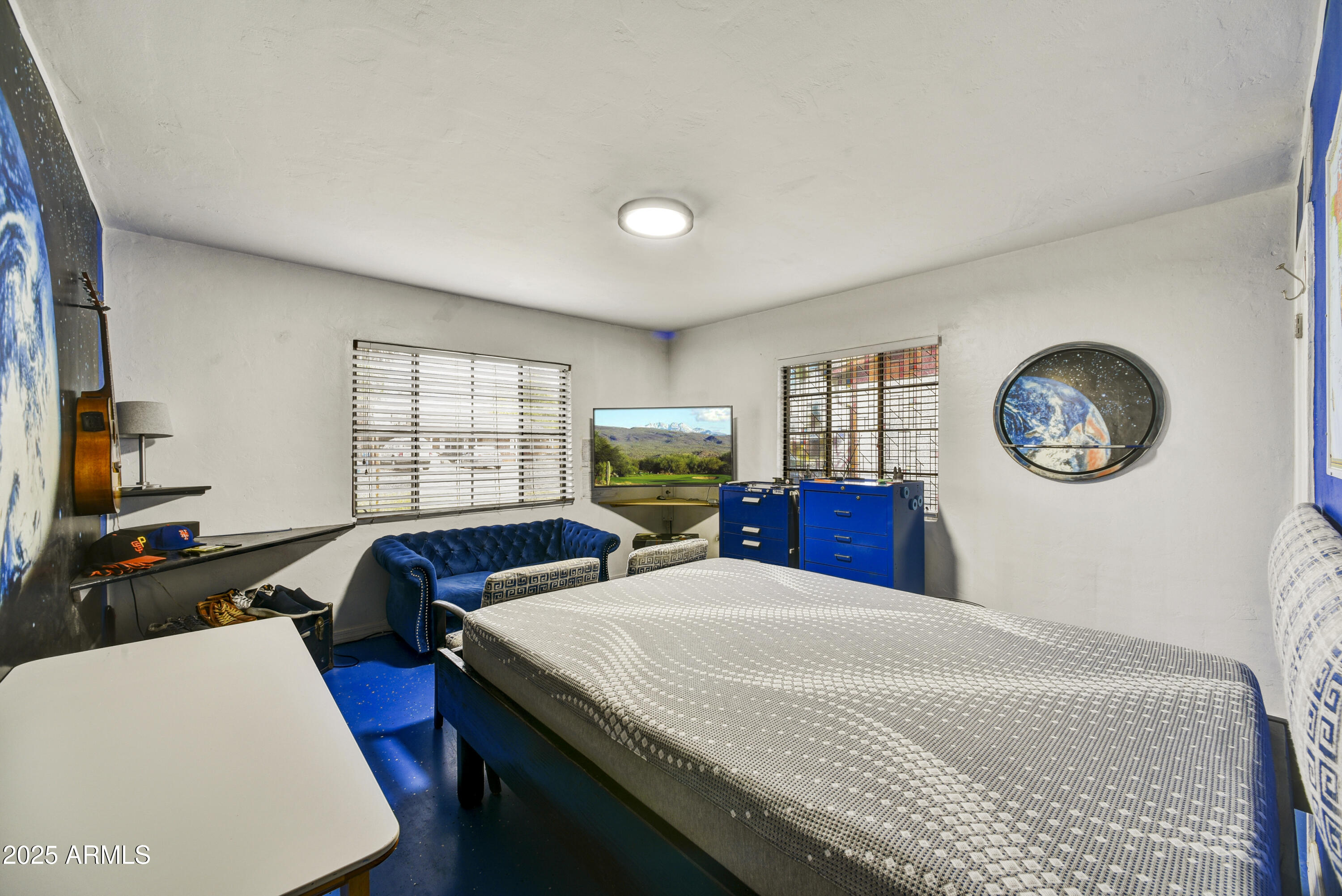 2045 West Orange Drive Phoenix, AZ 85015 - Photo 7 of 20 a bedroom with furniture and a window