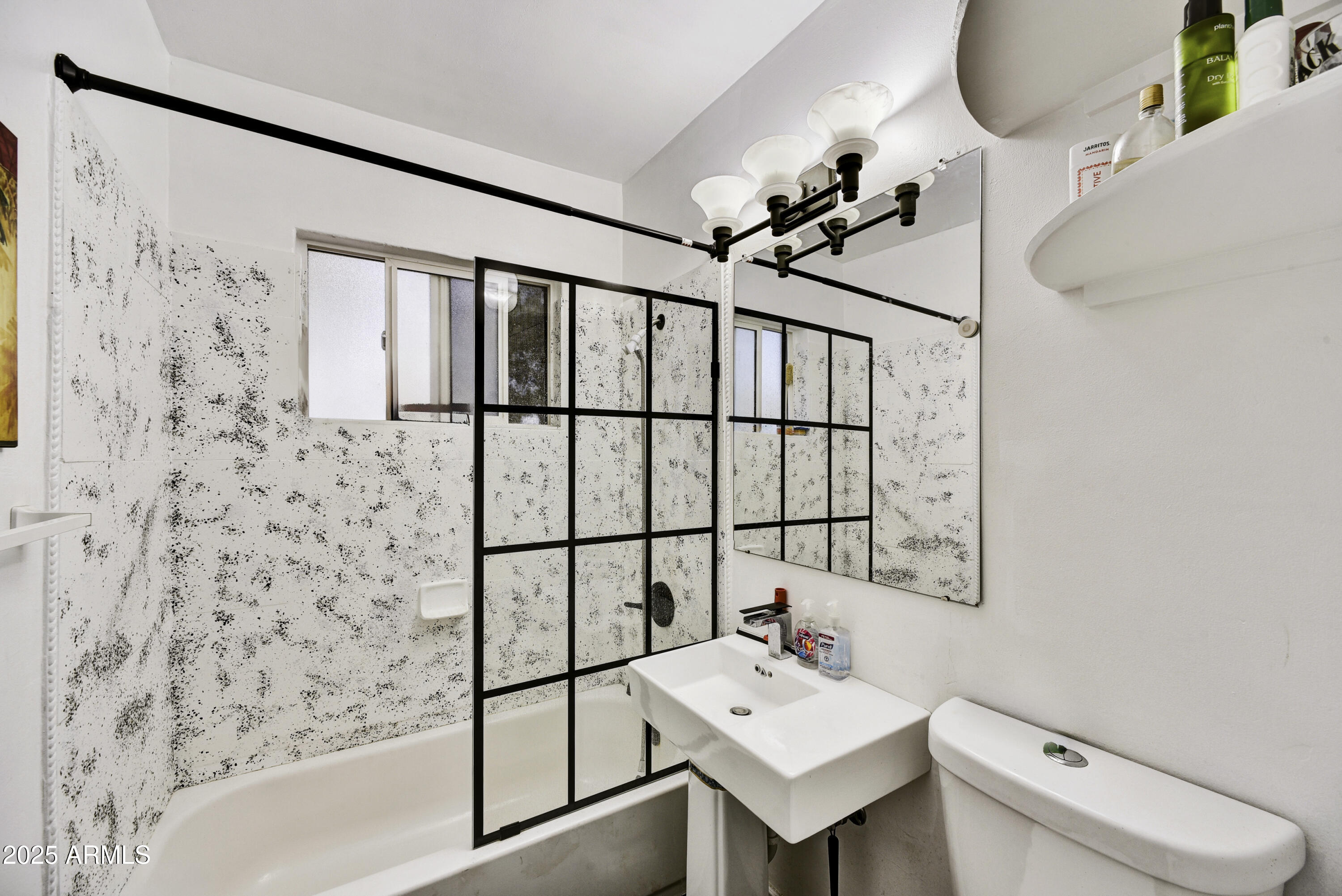 2045 West Orange Drive Phoenix, AZ 85015 - Photo 8 of 20 a bathroom with a sink toilet and shower
