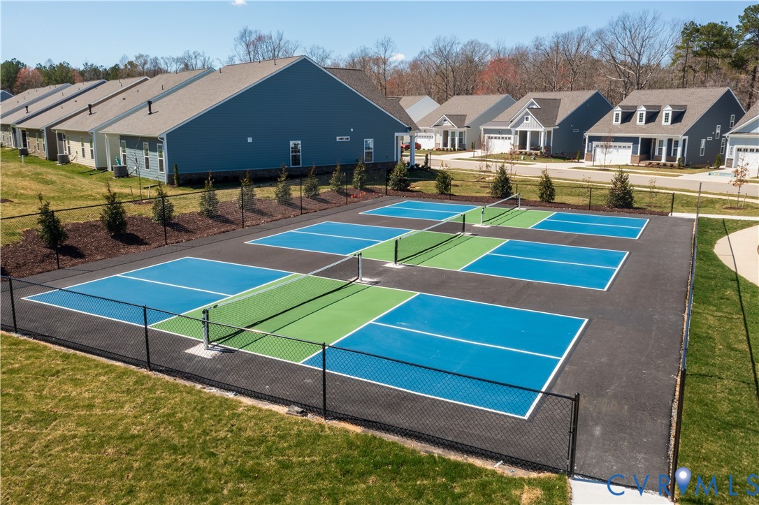 0 Canoe Pointe Loop, Unit 992 Moseley, VA 23120 - Photo 20 of 20 a front view of a house with swimming pool