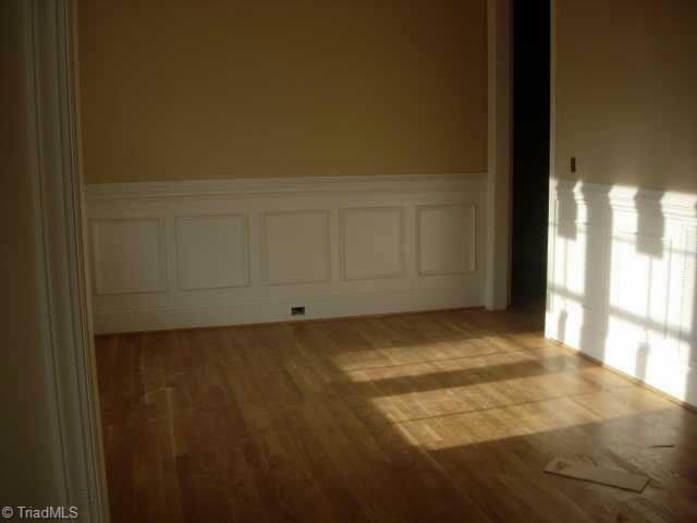 505 Starfire Court Oak Ridge, NC 27310 - Photo 4 of 4 Other. Extensive trimwork throughout house including crown moulding, chair rail and picture frames in dining room