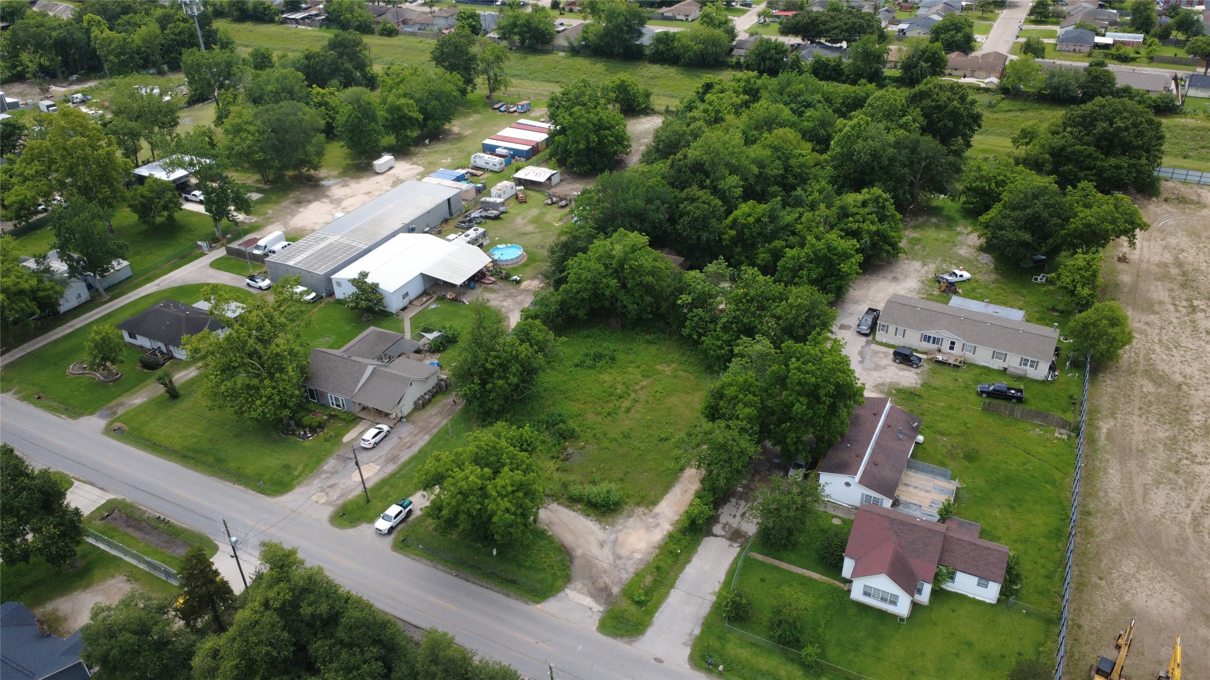 11921 Gloger Street Houston, TX 77039 - Photo 4 of 5 an aerial view of a house with a yard