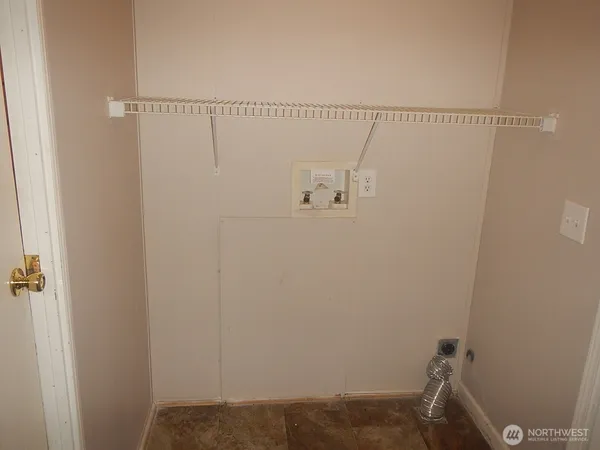a bathroom with a toilet and a sink