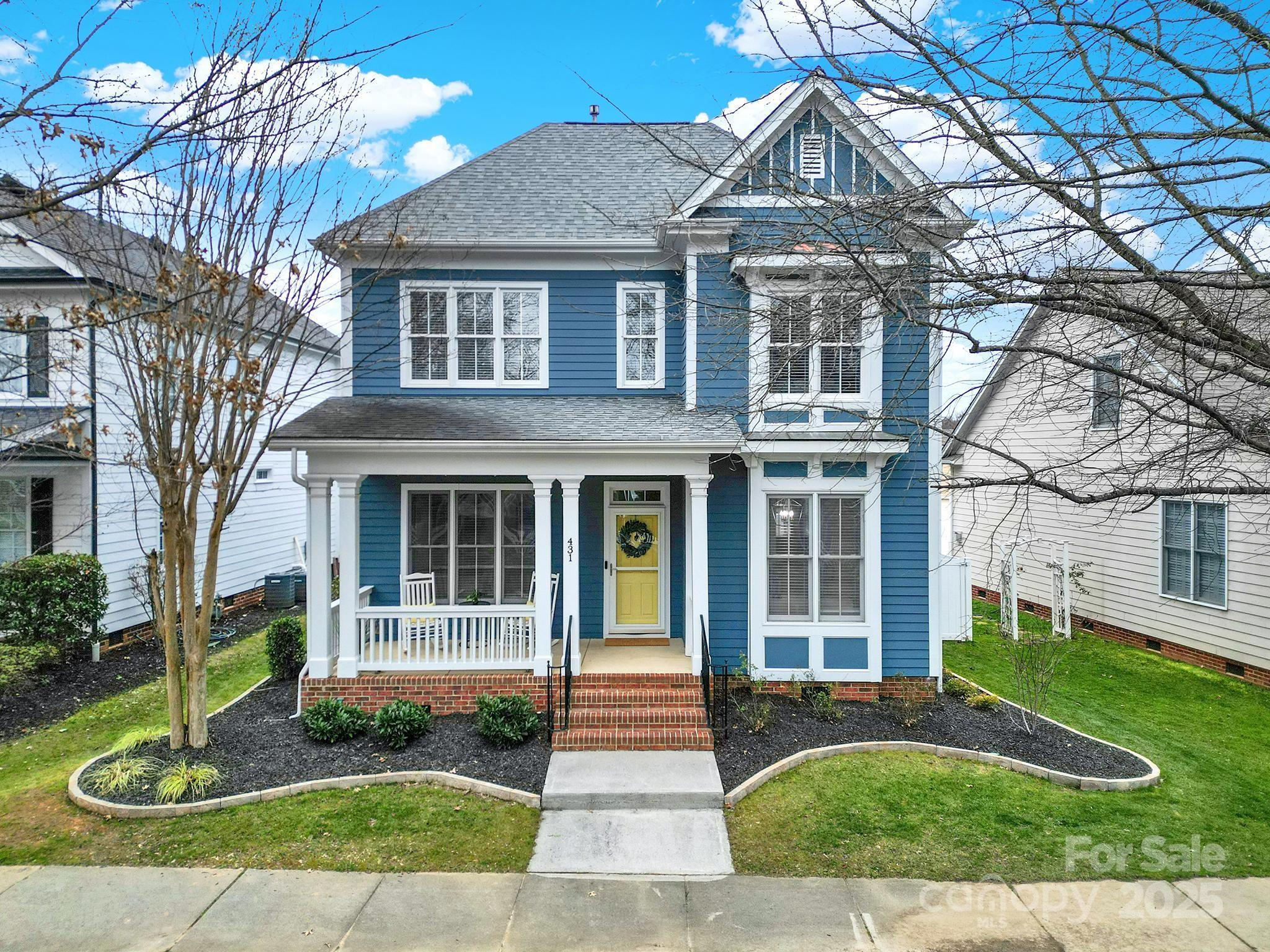 431 Third Baxter Street Fort Mill, SC 29708 - Photo 1 of 39 a front view of a house with a yard