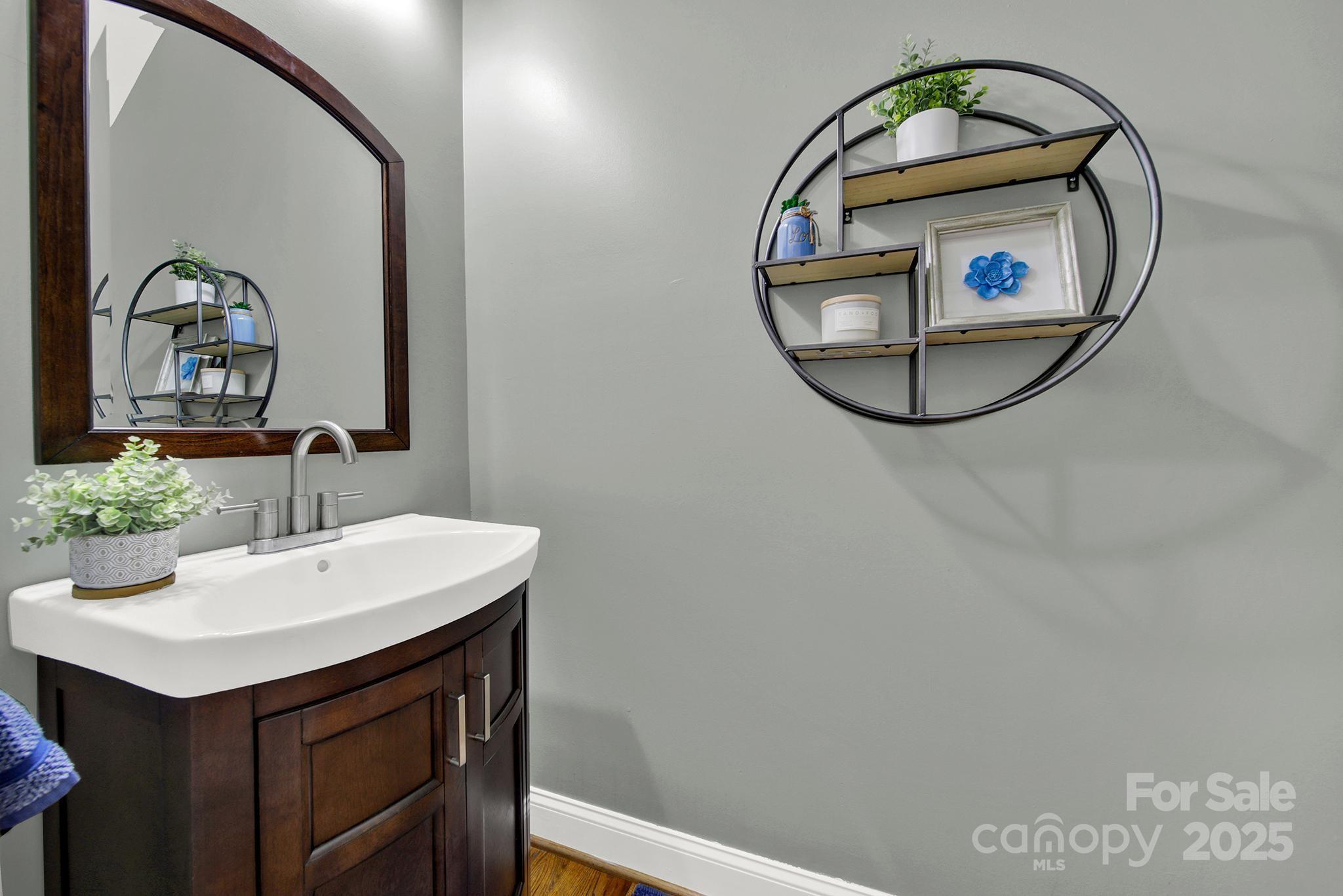 431 Third Baxter Street Fort Mill, SC 29708 - Photo 11 of 39 a bathroom with a sink and a mirror