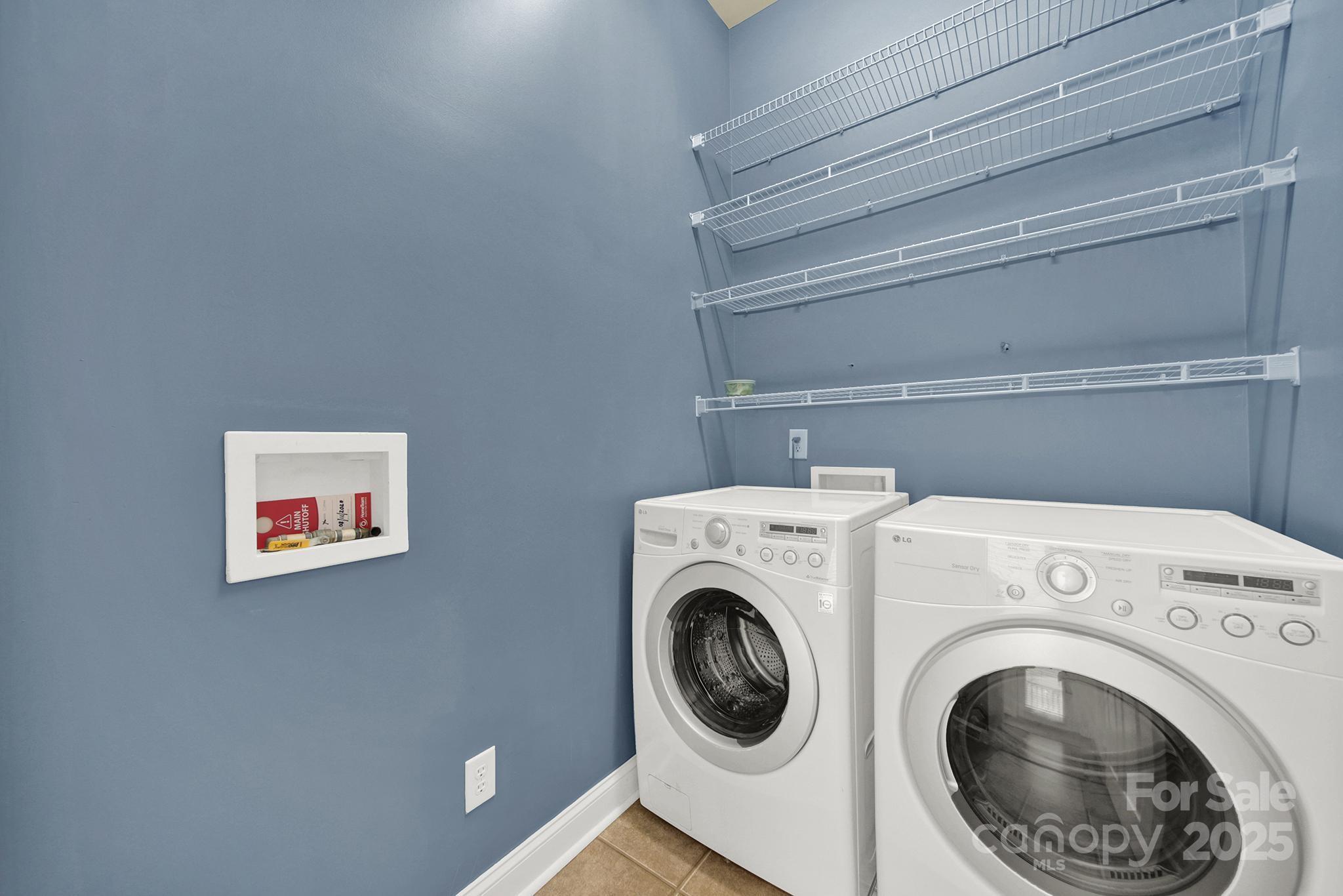 431 Third Baxter Street Fort Mill, SC 29708 - Photo 14 of 39 a utility room with dryer and washer