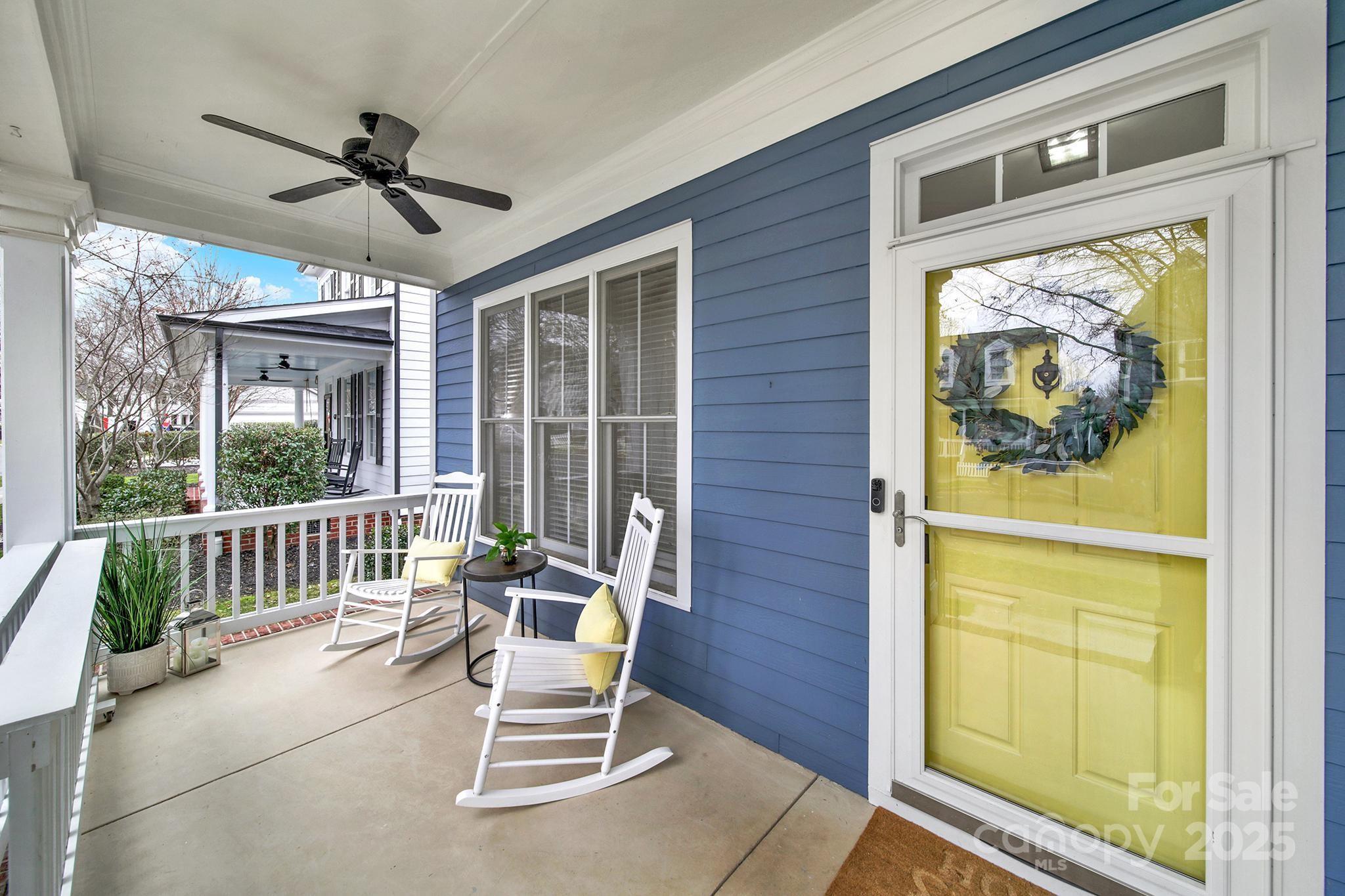 431 Third Baxter Street Fort Mill, SC 29708 - Photo 2 of 39 a work space with wooden floor and a ceiling fan