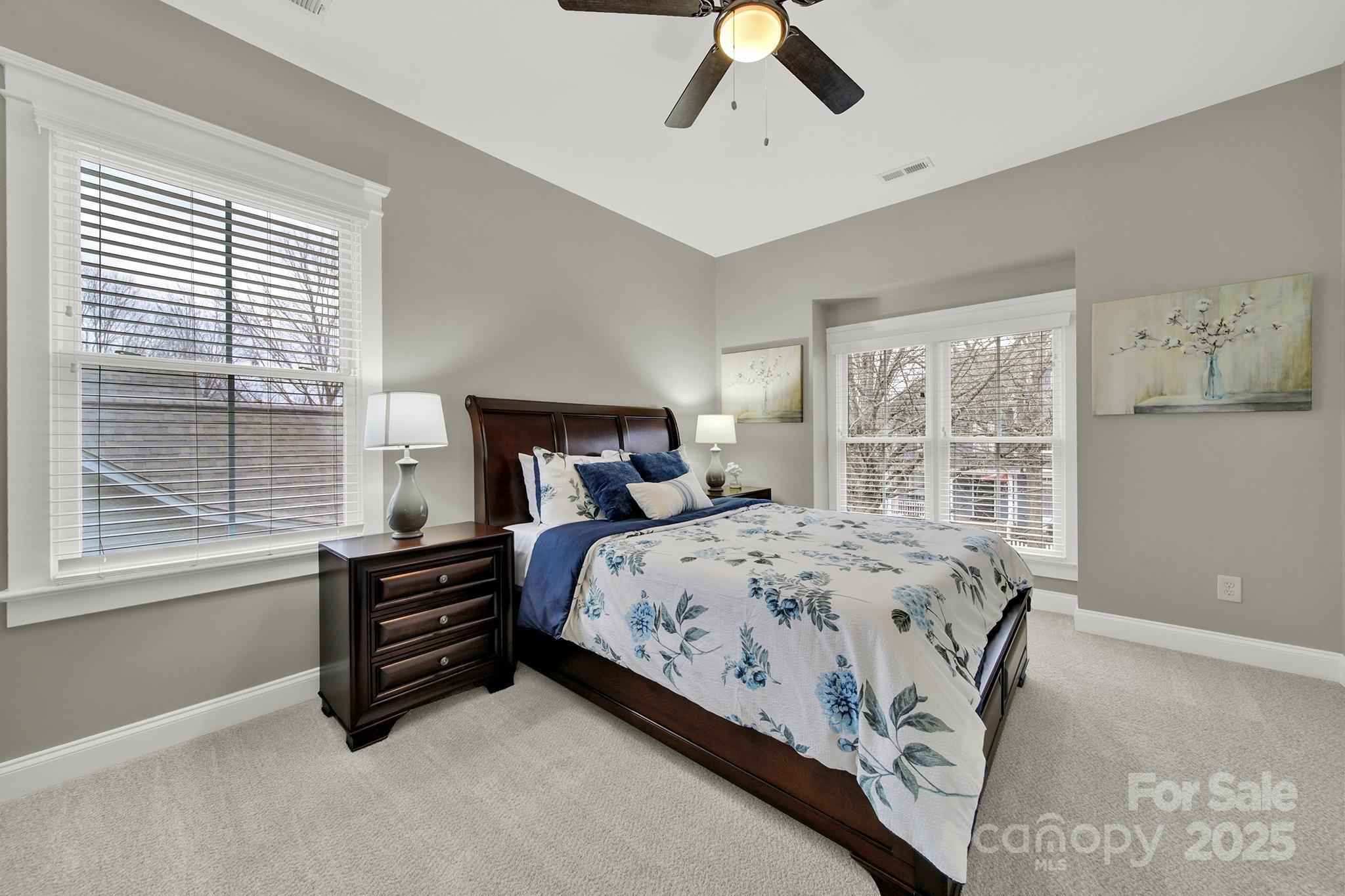 431 Third Baxter Street Fort Mill, SC 29708 - Photo 23 of 39 a bedroom with a bed dresser and a window