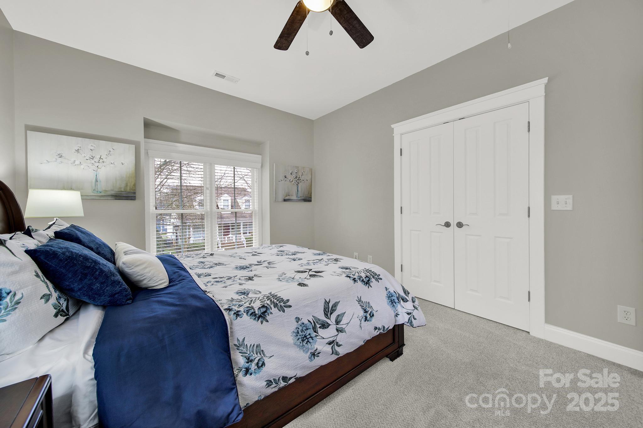 431 Third Baxter Street Fort Mill, SC 29708 - Photo 24 of 39 a bedroom with a bed and a window