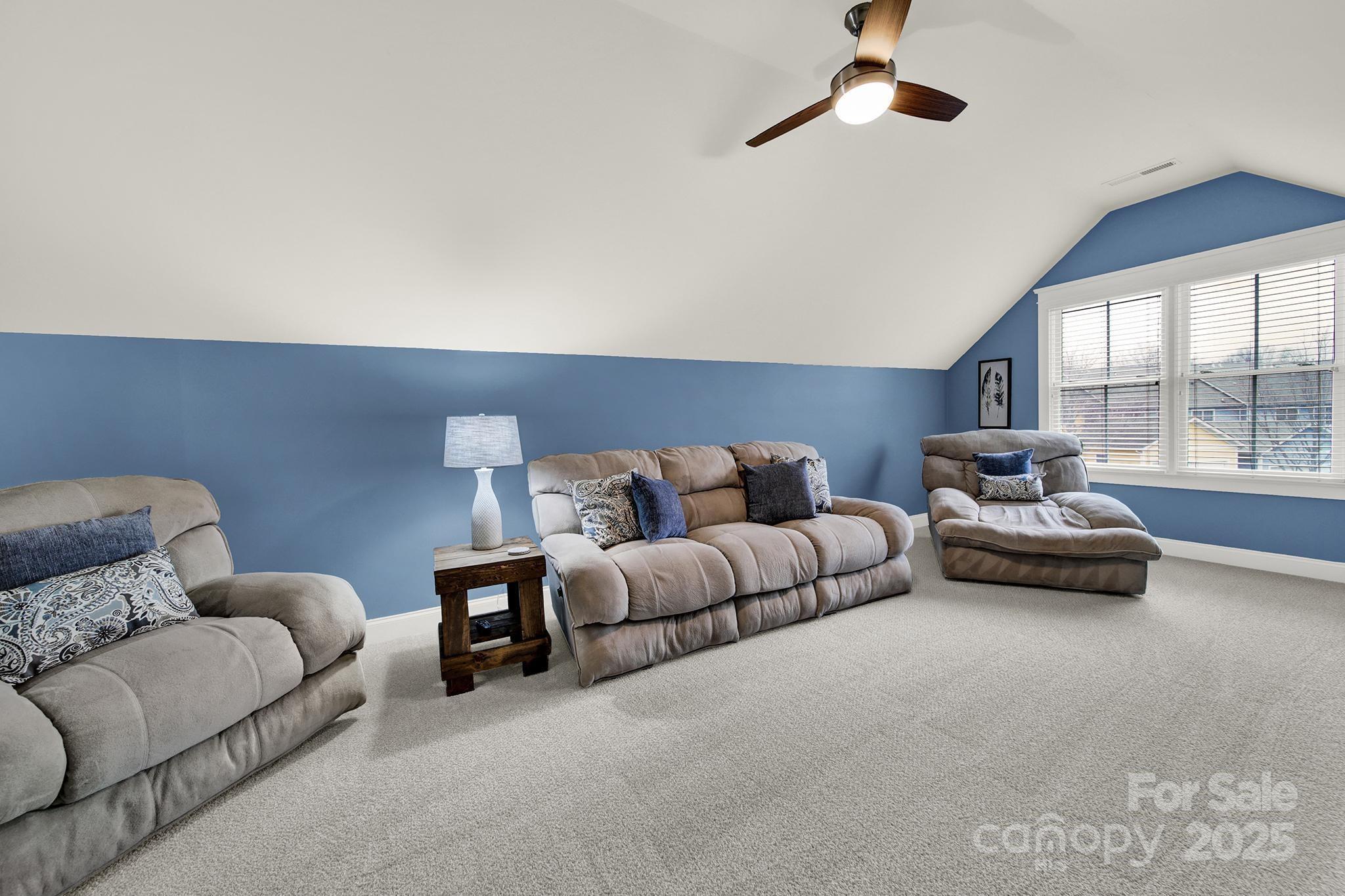 431 Third Baxter Street Fort Mill, SC 29708 - Photo 28 of 39 a living room with furniture and a window
