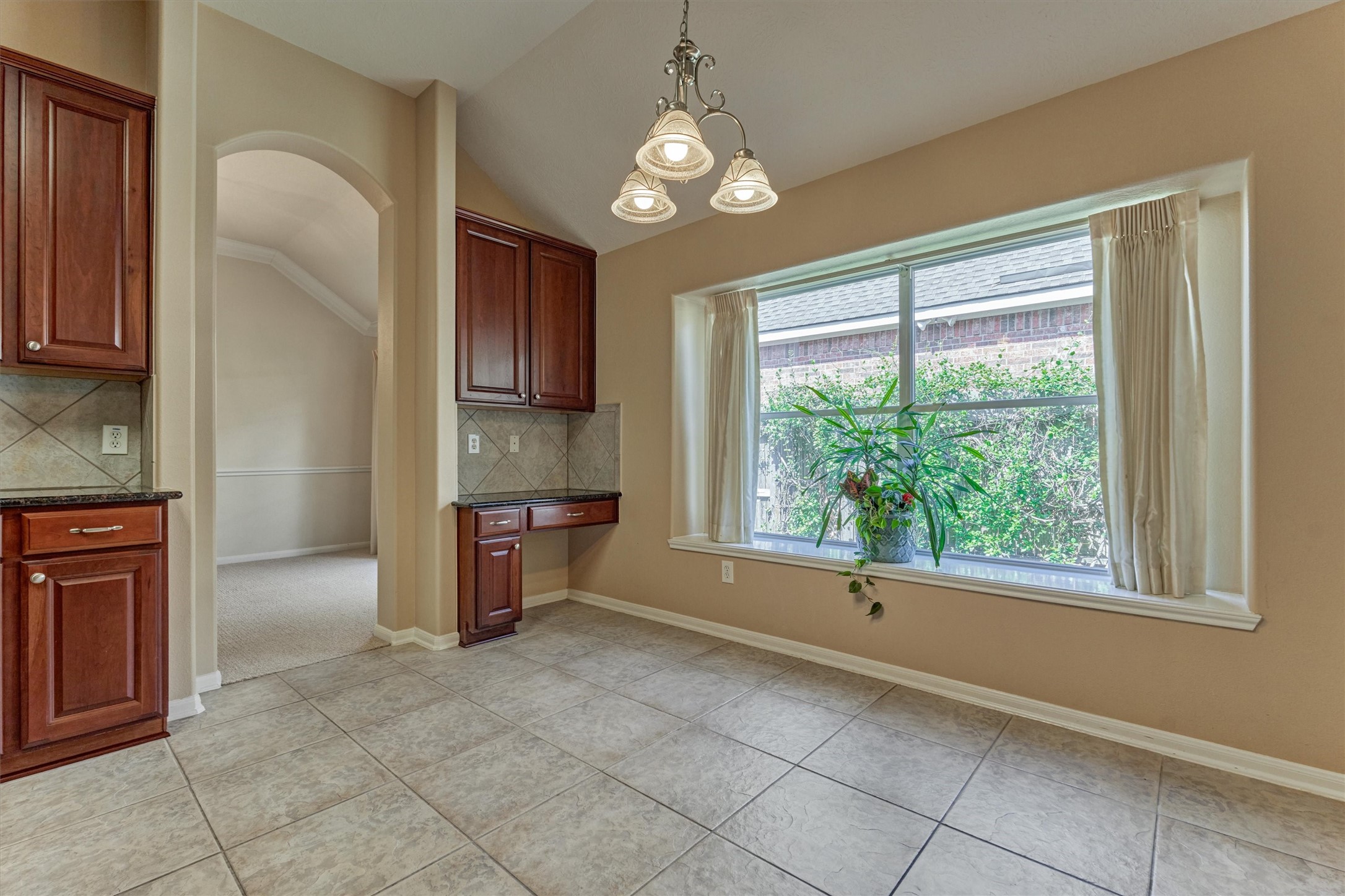 24910 Corbin Gate Drive Spring, TX 77389 - Photo 19 of 49 a view of a kitchen with furniture and natural light