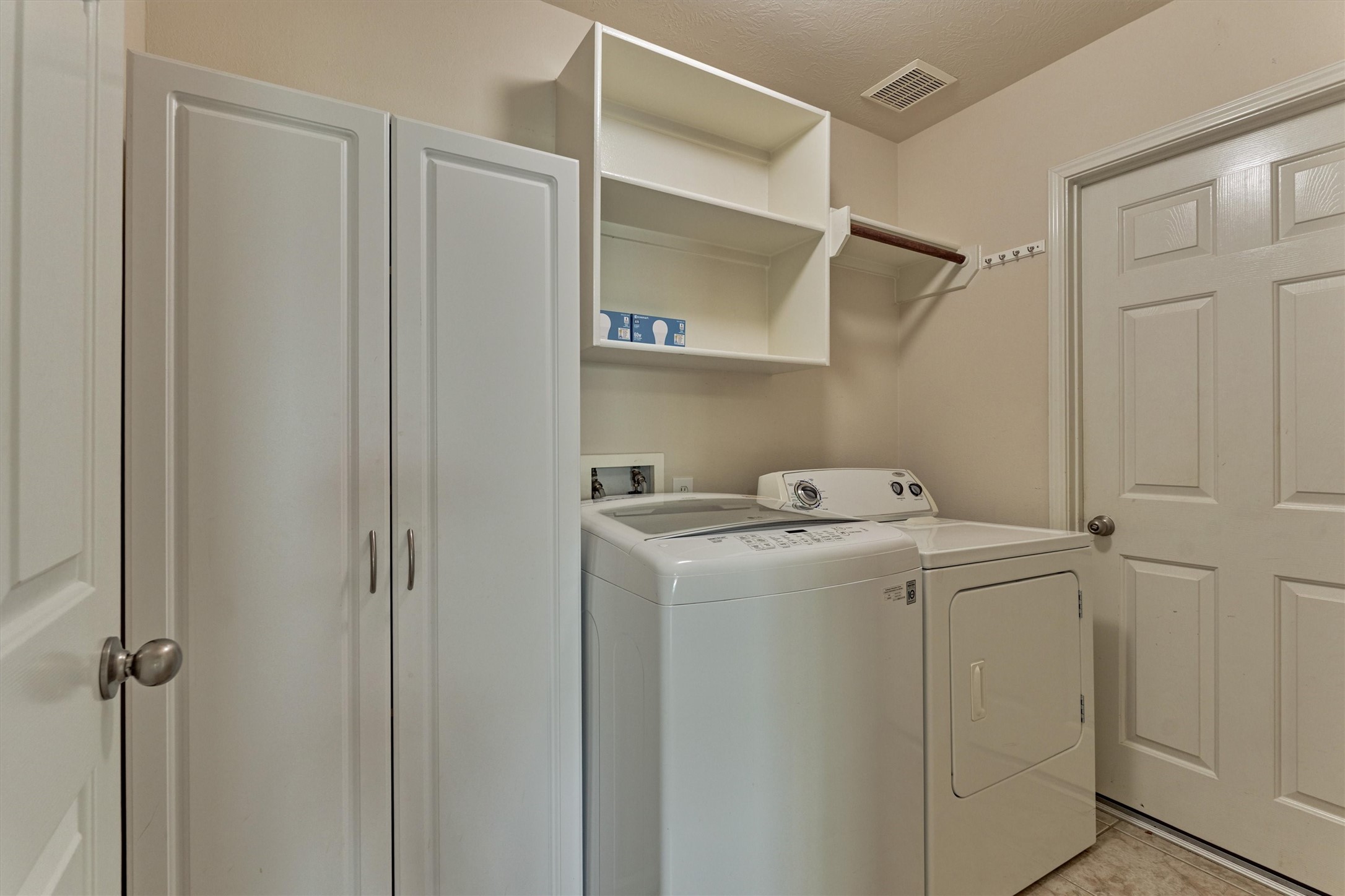 24910 Corbin Gate Drive Spring, TX 77389 - Photo 27 of 49 a utility room with dryer and washer