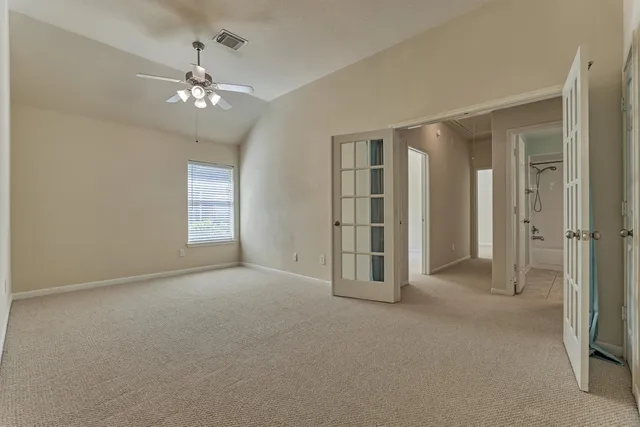 wooden floor and windows in an empty room