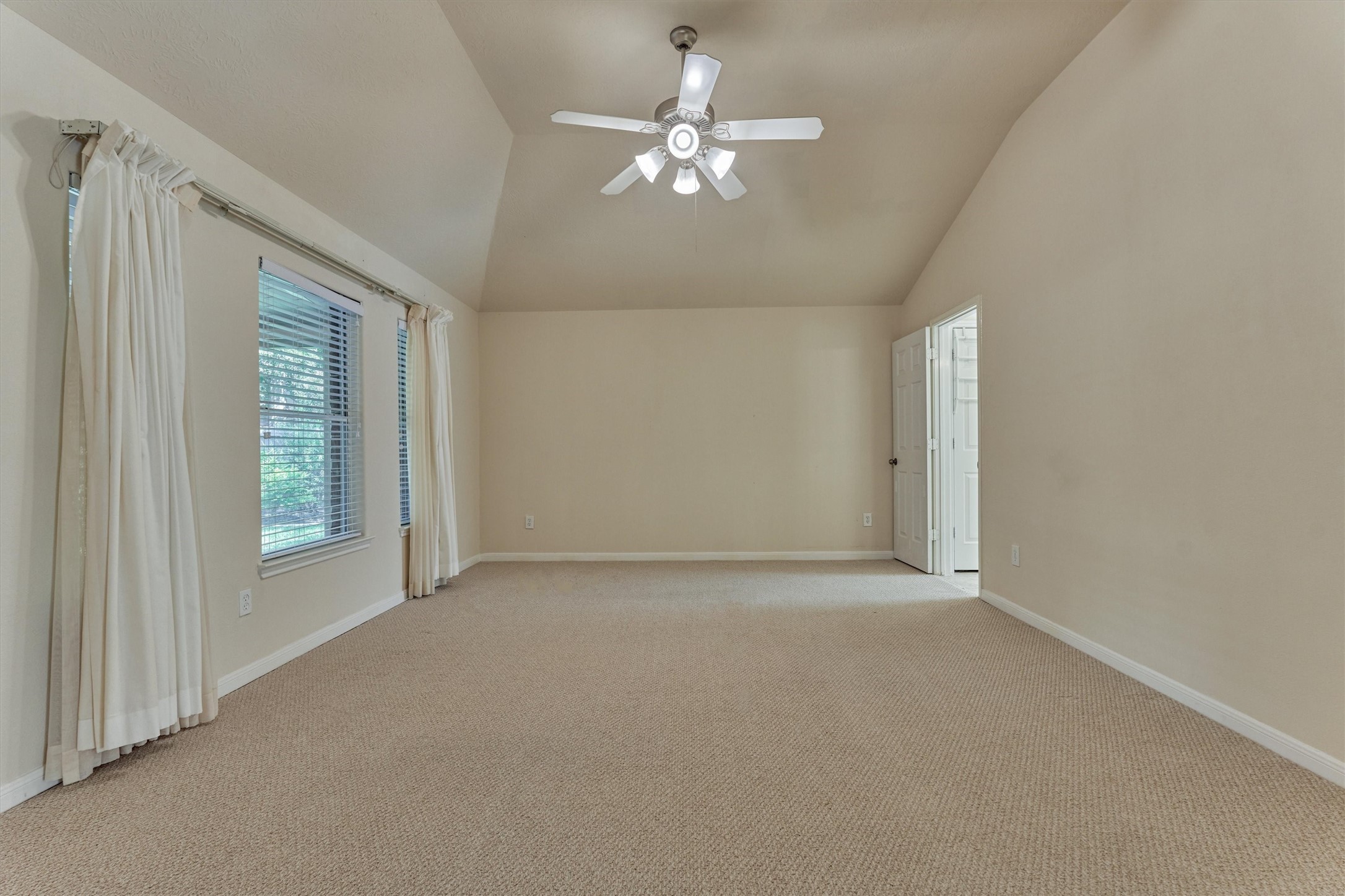 24910 Corbin Gate Drive Spring, TX 77389 - Photo 31 of 49 a view of an empty room with a window
