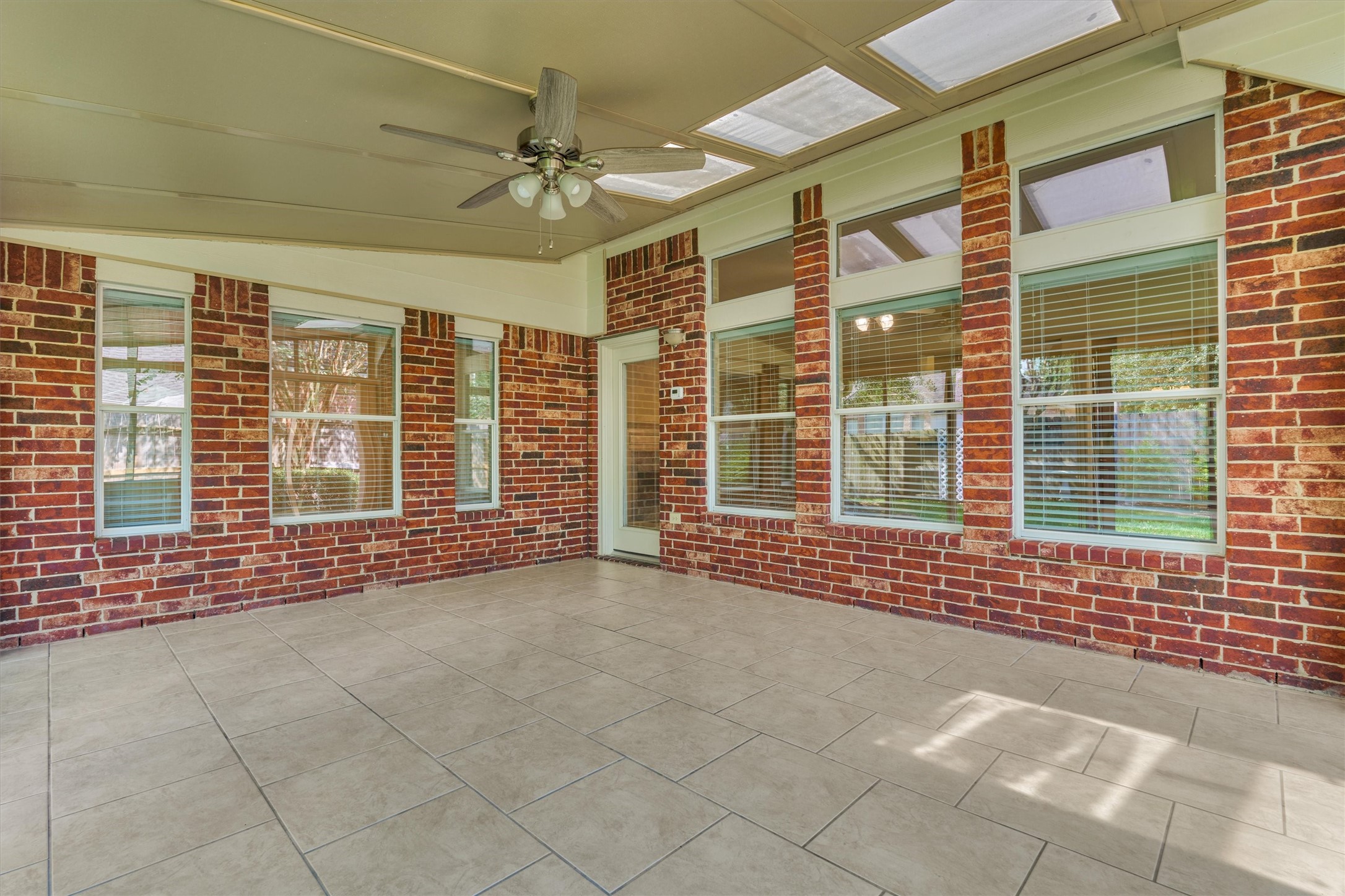 24910 Corbin Gate Drive Spring, TX 77389 - Photo 47 of 49 a view of an empty room with a balcony