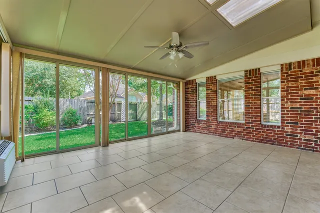 a view of empty room with windows