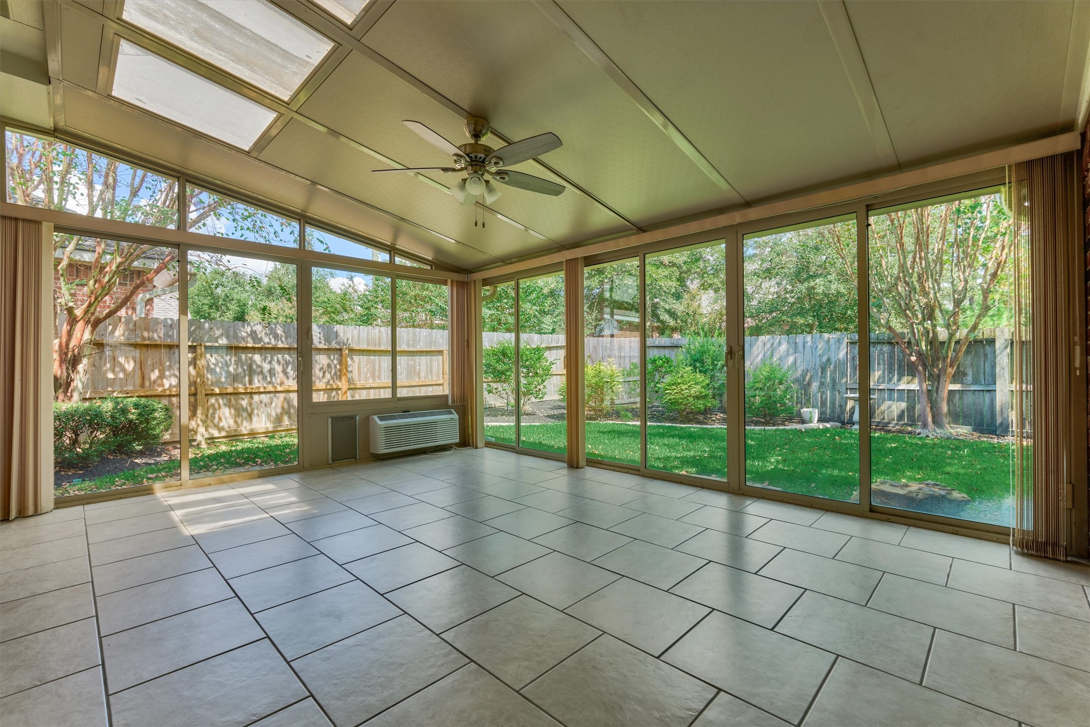 24910 Corbin Gate Drive Spring, TX 77389 - Photo 49 of 49 a view of room with window and ceiling fan