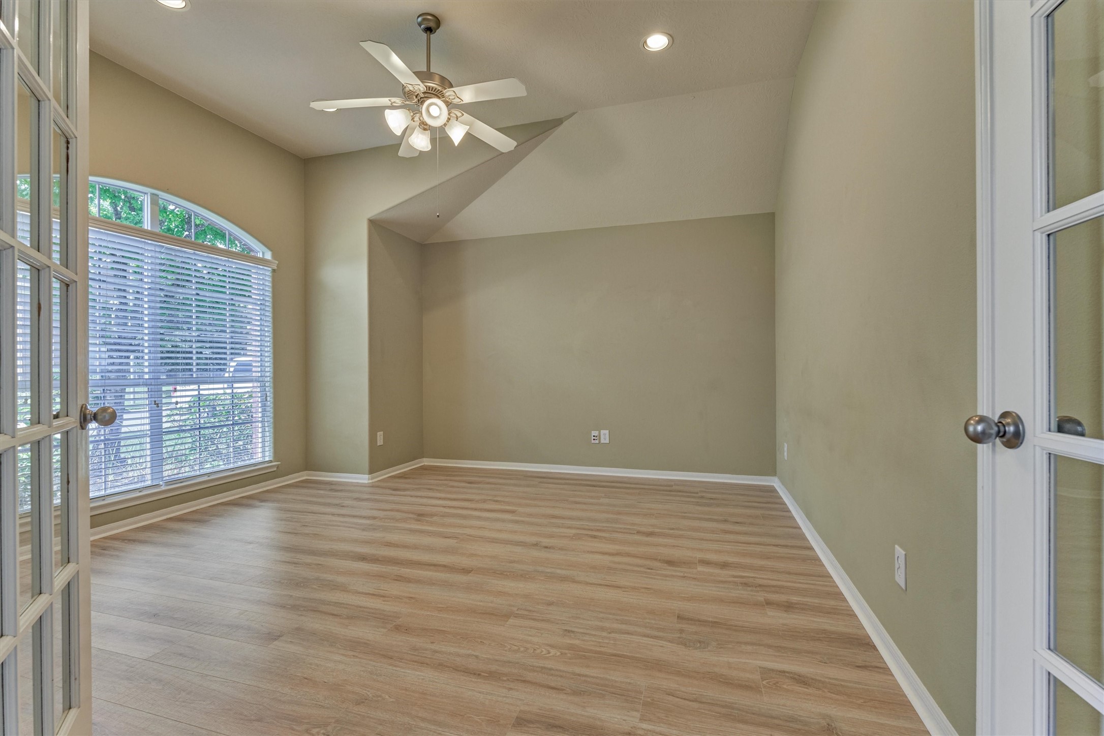 24910 Corbin Gate Drive Spring, TX 77389 - Photo 9 of 49 wooden floor in an empty room with a window