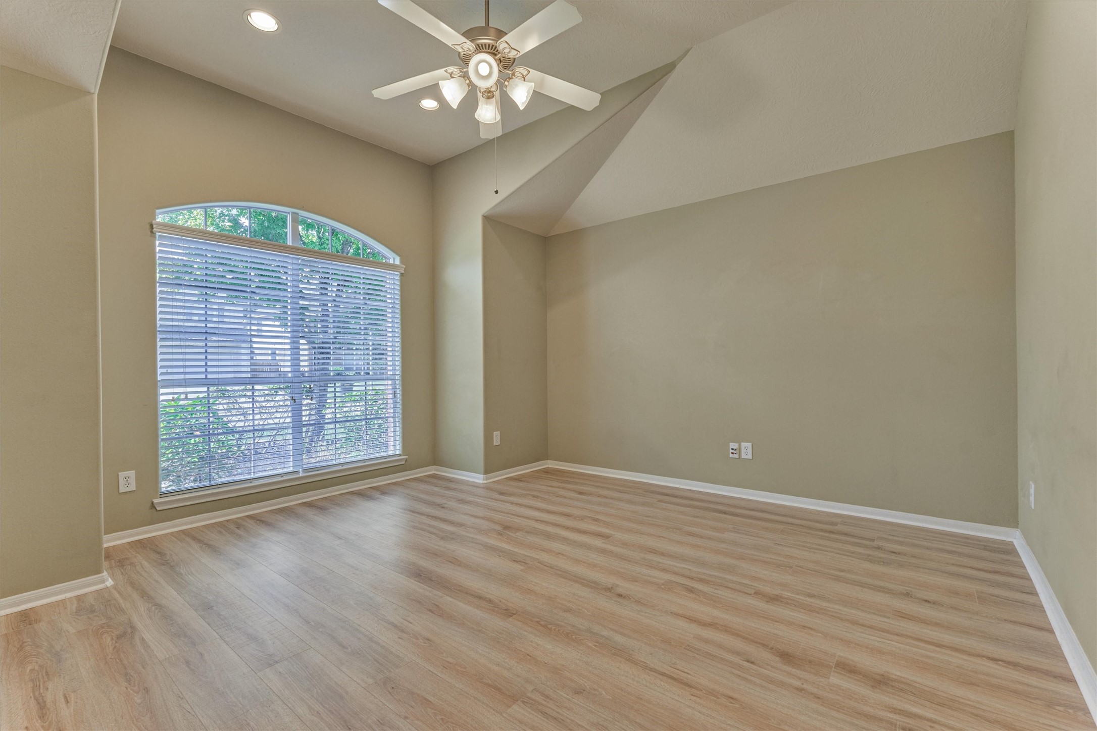 24910 Corbin Gate Drive Spring, TX 77389 - Photo 10 of 49 wooden floor in an empty room with a window