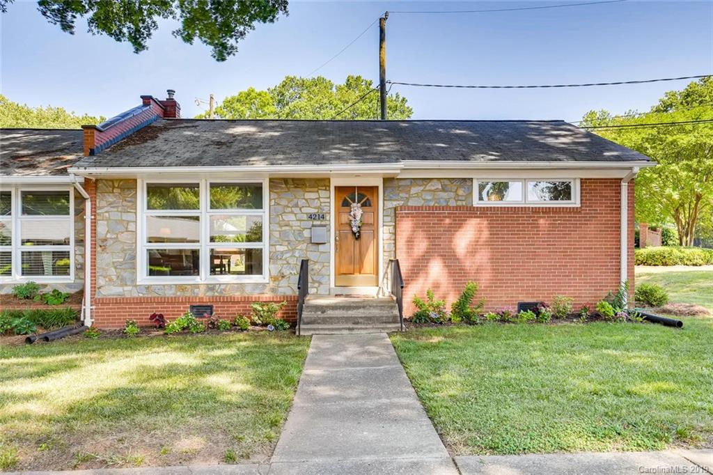 4214 Randolph Road Charlotte, NC 28211 - Photo 1 of 17 front view of a house with a yard