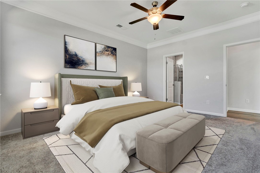 270 Pendergast Road Greenville, SC 29605 - Photo 16 of 43 A restful chamber awaits, complete with soft carpeting and a ceiling fan for comfort.