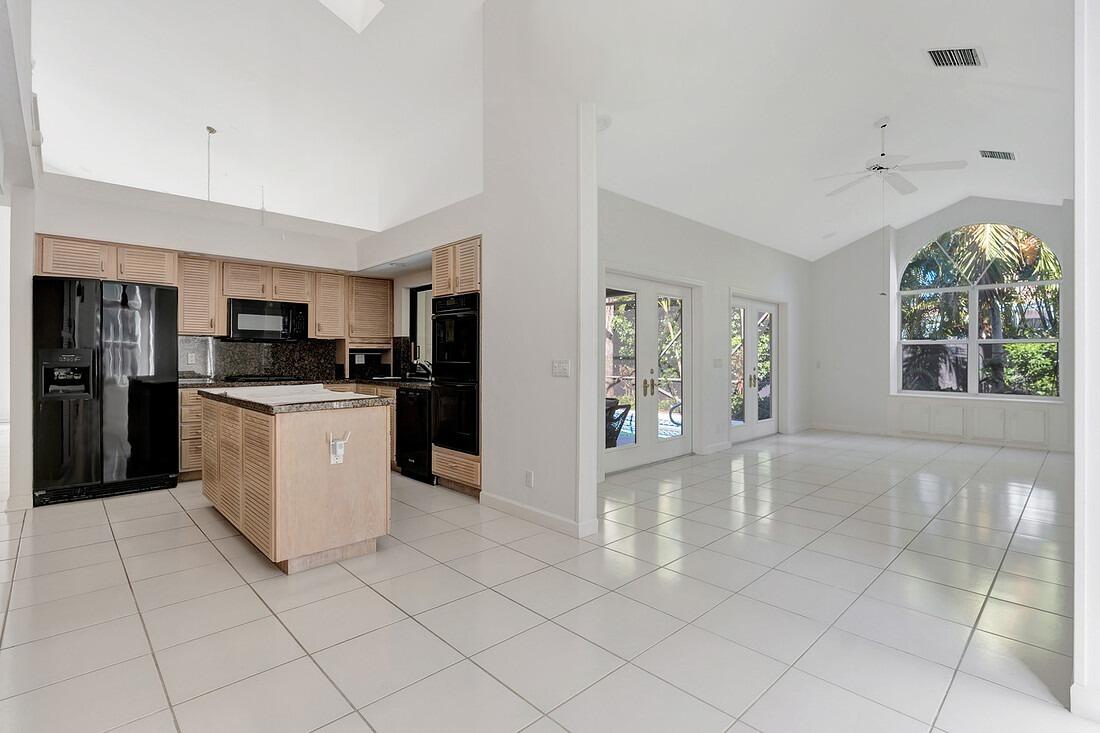 115 Olympus Way Jupiter, FL 33477 - Photo 12 of 44 Existing Kitch + family room