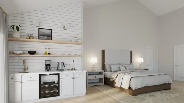 a bedroom with bed and a window