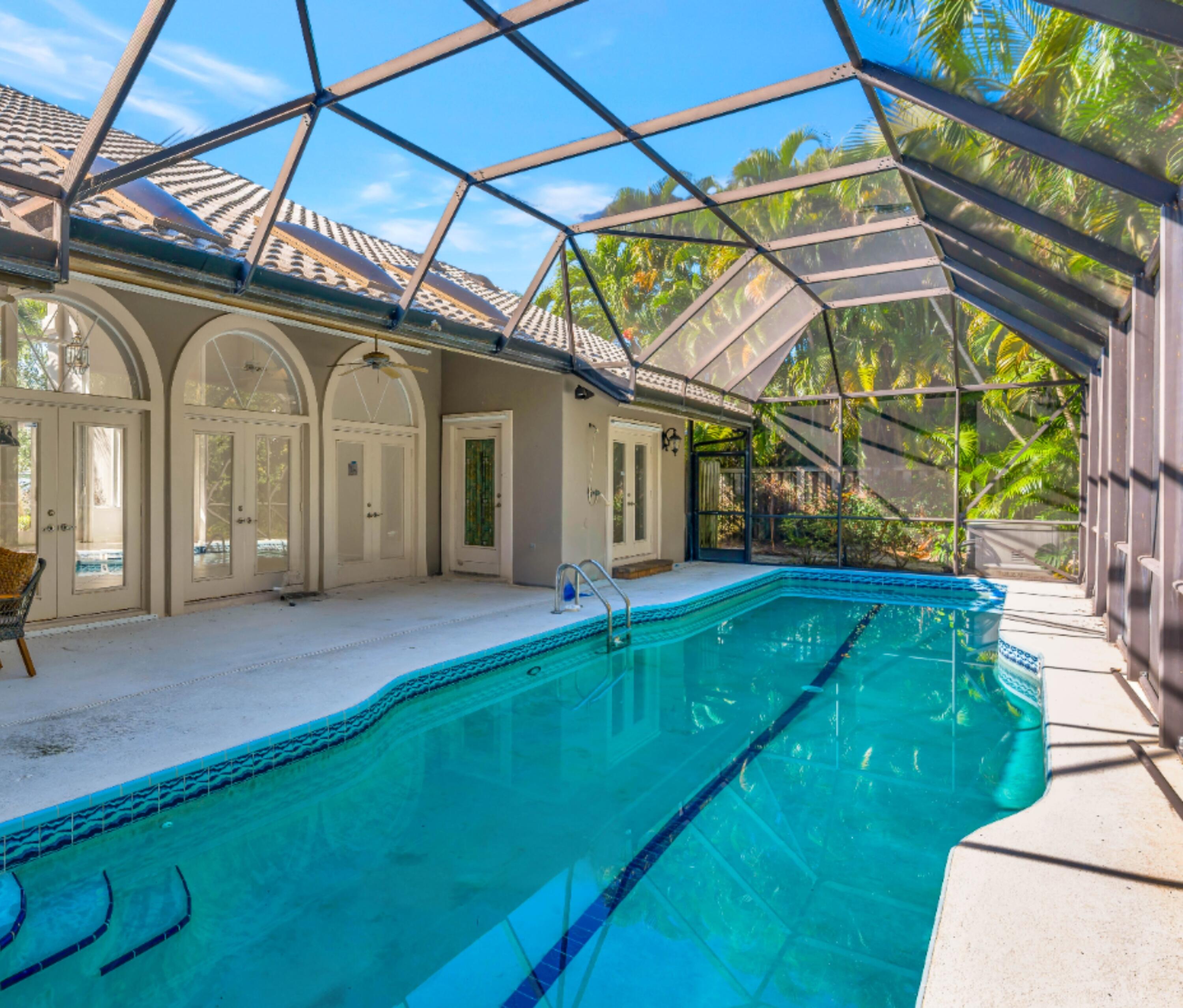 115 Olympus Way Jupiter, FL 33477 - Photo 30 of 44 Lap pool and loggia
