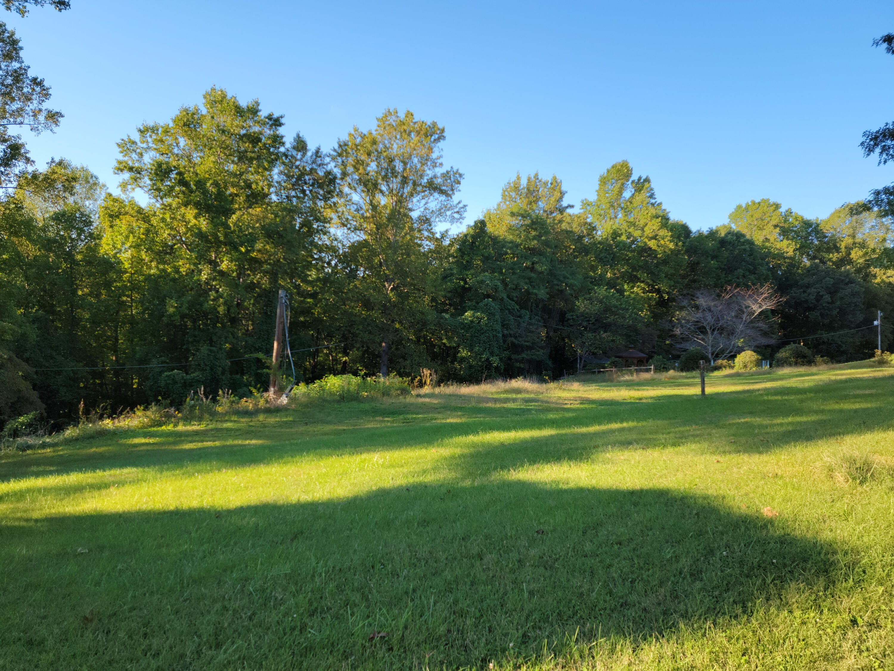 1465 Carroll Road Goodview, VA 24095 - Photo 2 of 2 a view of swimming pool with an outdoor space and seating area