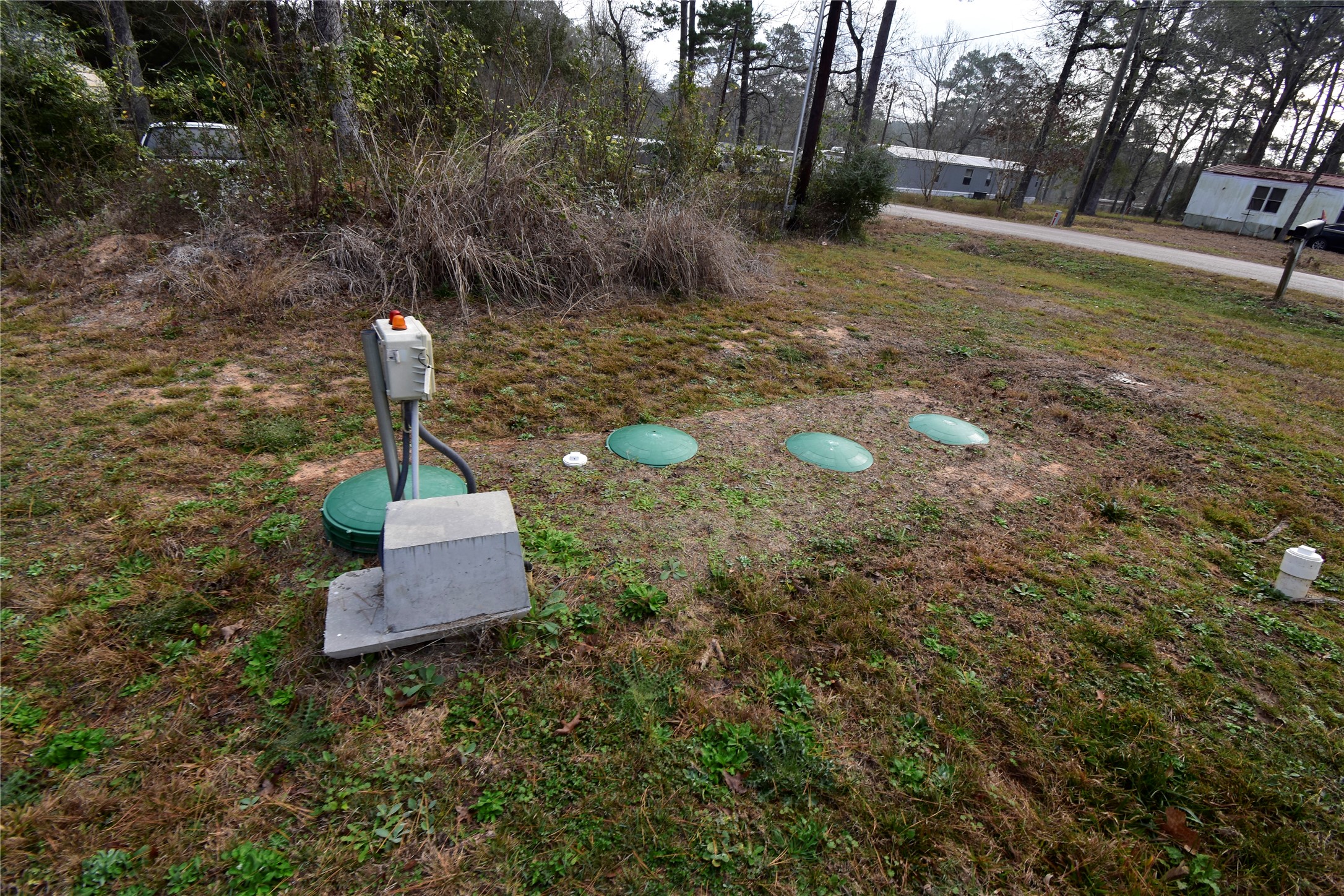 2 Lakeview Lane Huntsville, TX 77340 - Photo 37 of 38 a fire hydrant in the middle of a field