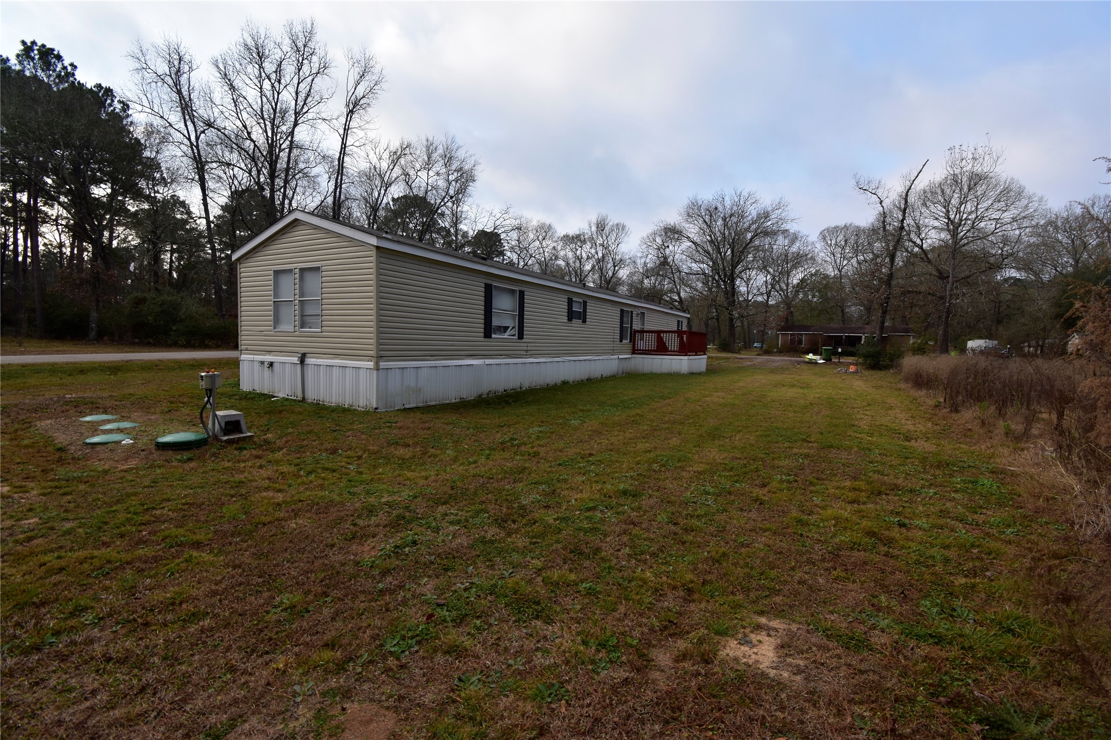 2 Lakeview Lane Huntsville, TX 77340 - Photo 7 of 38 a view of a house with a yard
