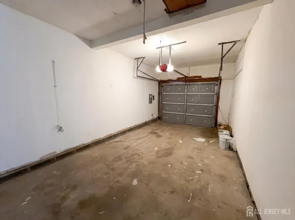 a view of empty room with stairs